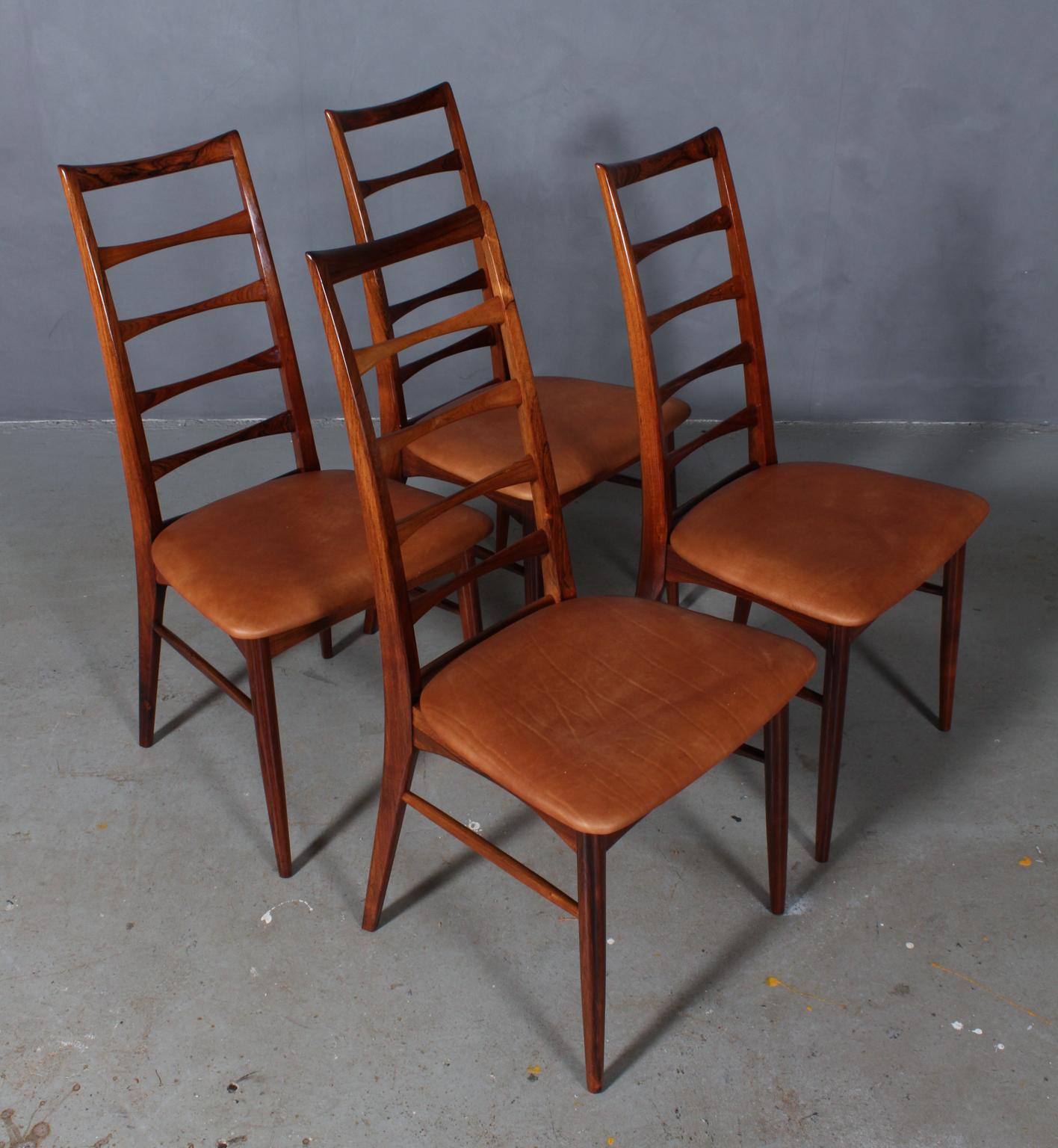 Set of Niels Koefoed dining chairs made in solid rosewood.

New upholstered in tan aniline leather.

Model Lis, made by Niels Koefoeds Møbelfabrik Hornslet, 1960s.

   