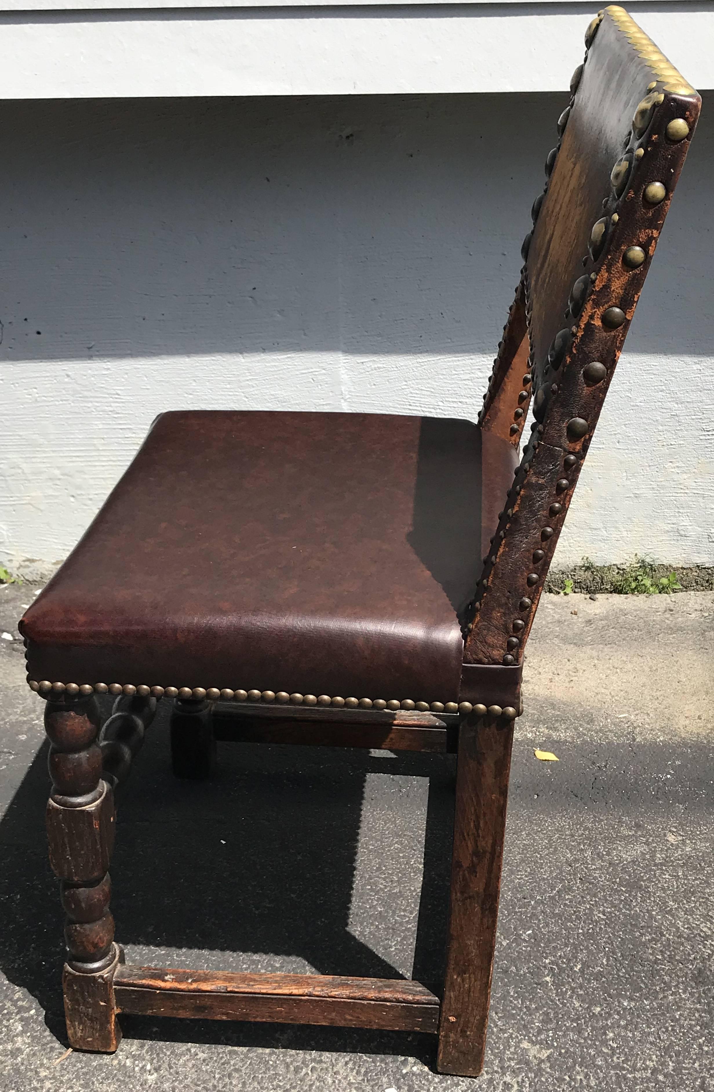 European Set of Nine 17th or 18th Century Continental Dining Chairs with Leather Backs