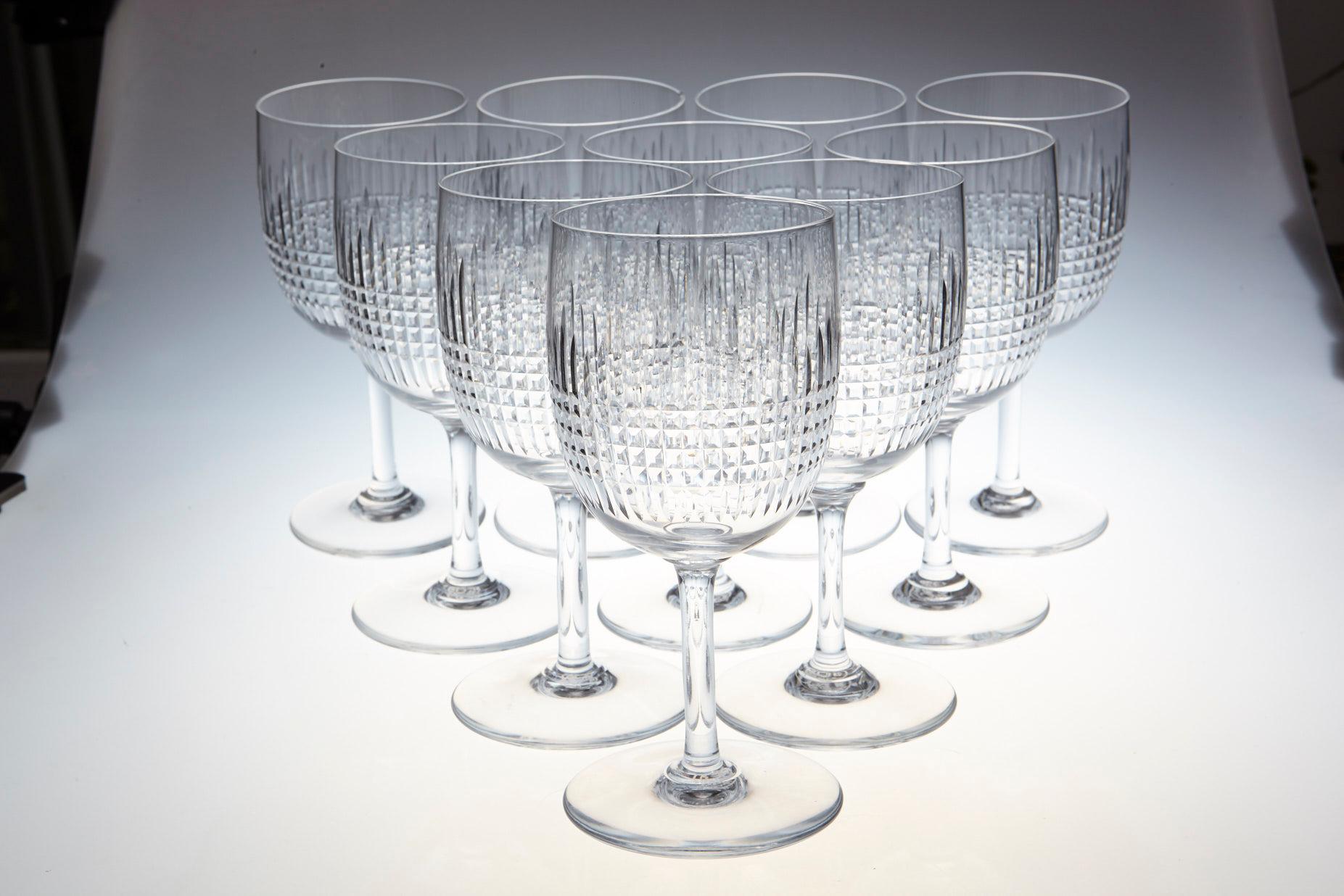 French Set of Nine Baccarat Crystal 'Nancy' Pattern White Wine Glasses, circa 1950s