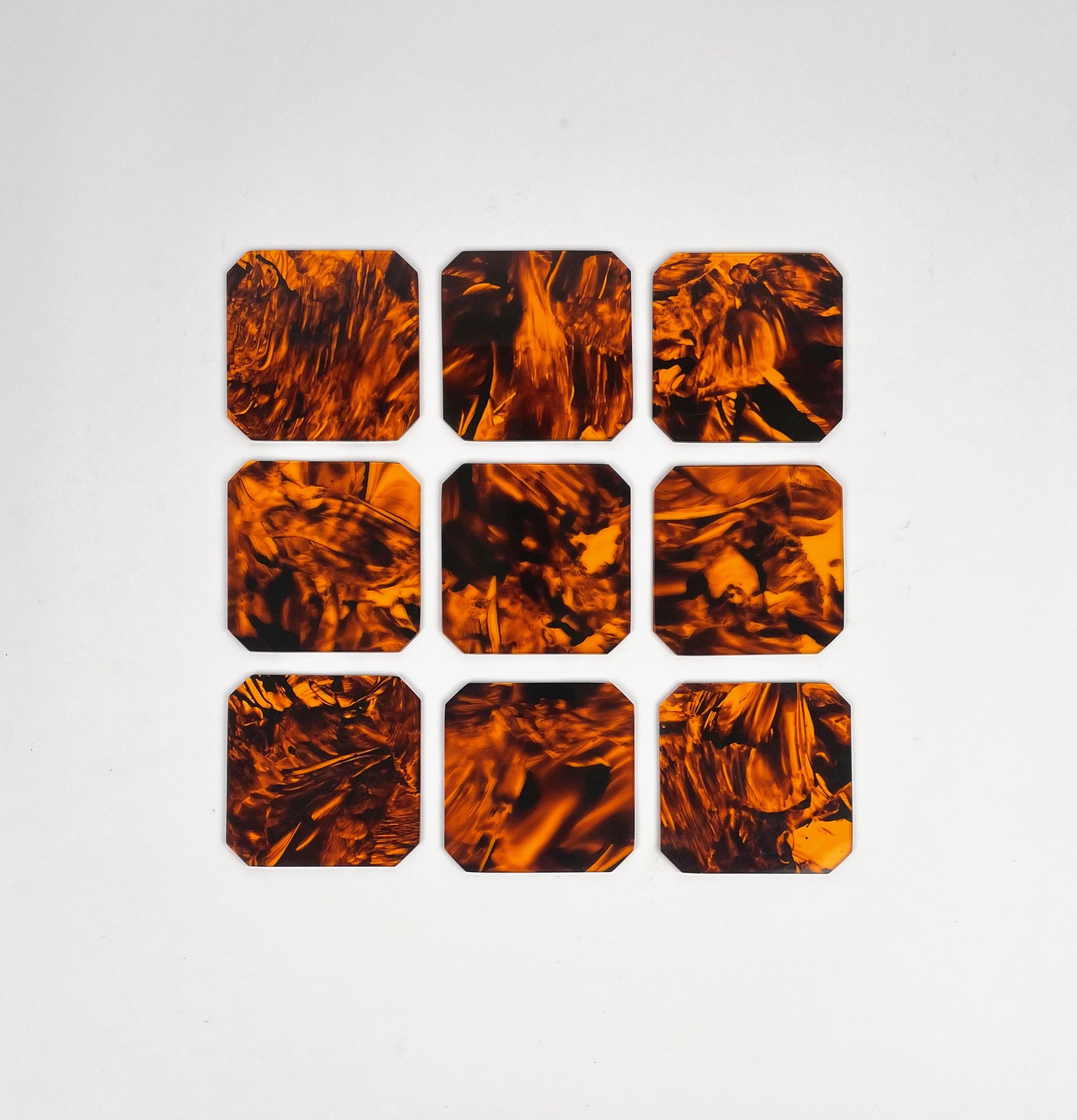 Set of Nine Coasters in Tortoiseshell Effect Lucite in the style of Christian Dior.

Made in Italy 1970s.