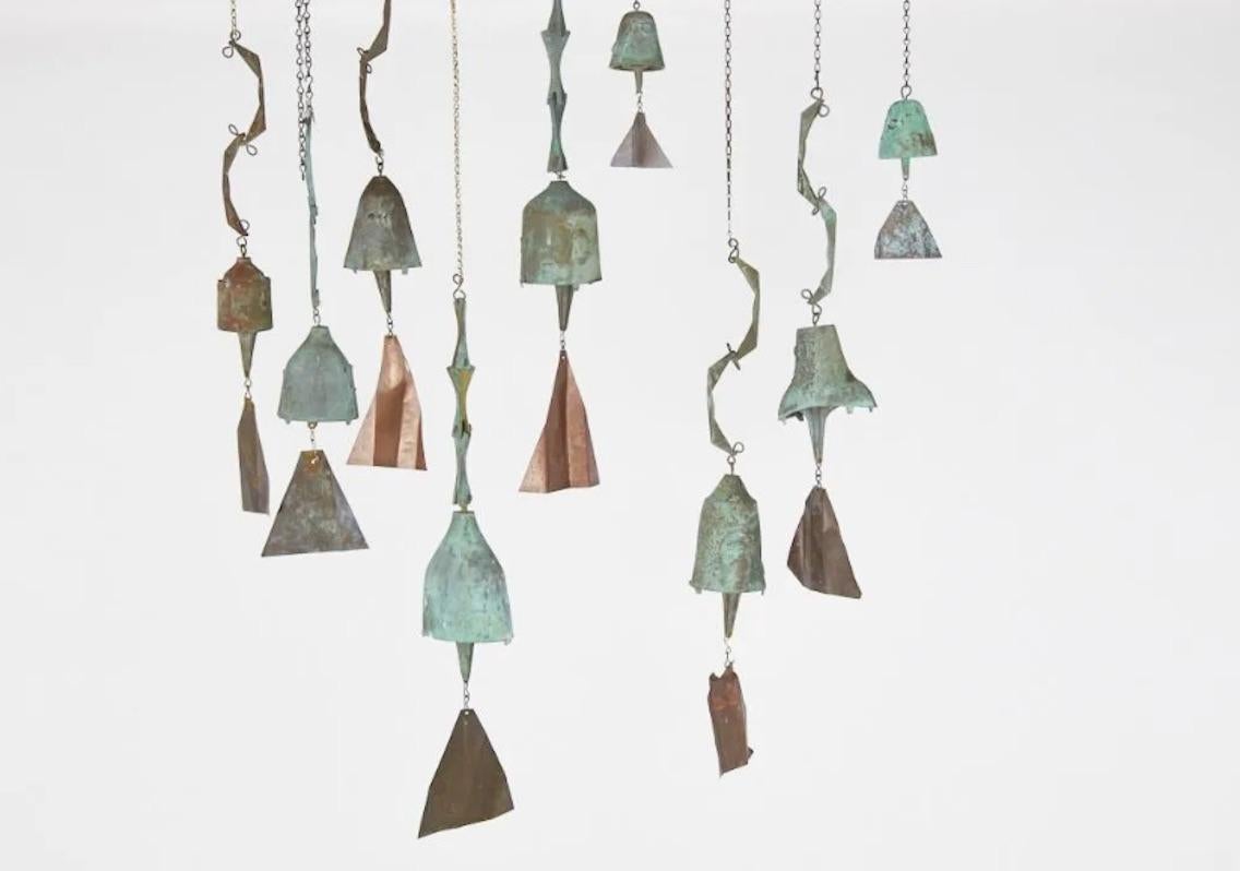 A unique collection of nine sculptural bronze bells in fine green patina, various sizes and height by Paolo Soleri (1919-2013) the Italian architect artist, philosopher, urban planner. Paolo Soleri was an Italian-born American architect. He