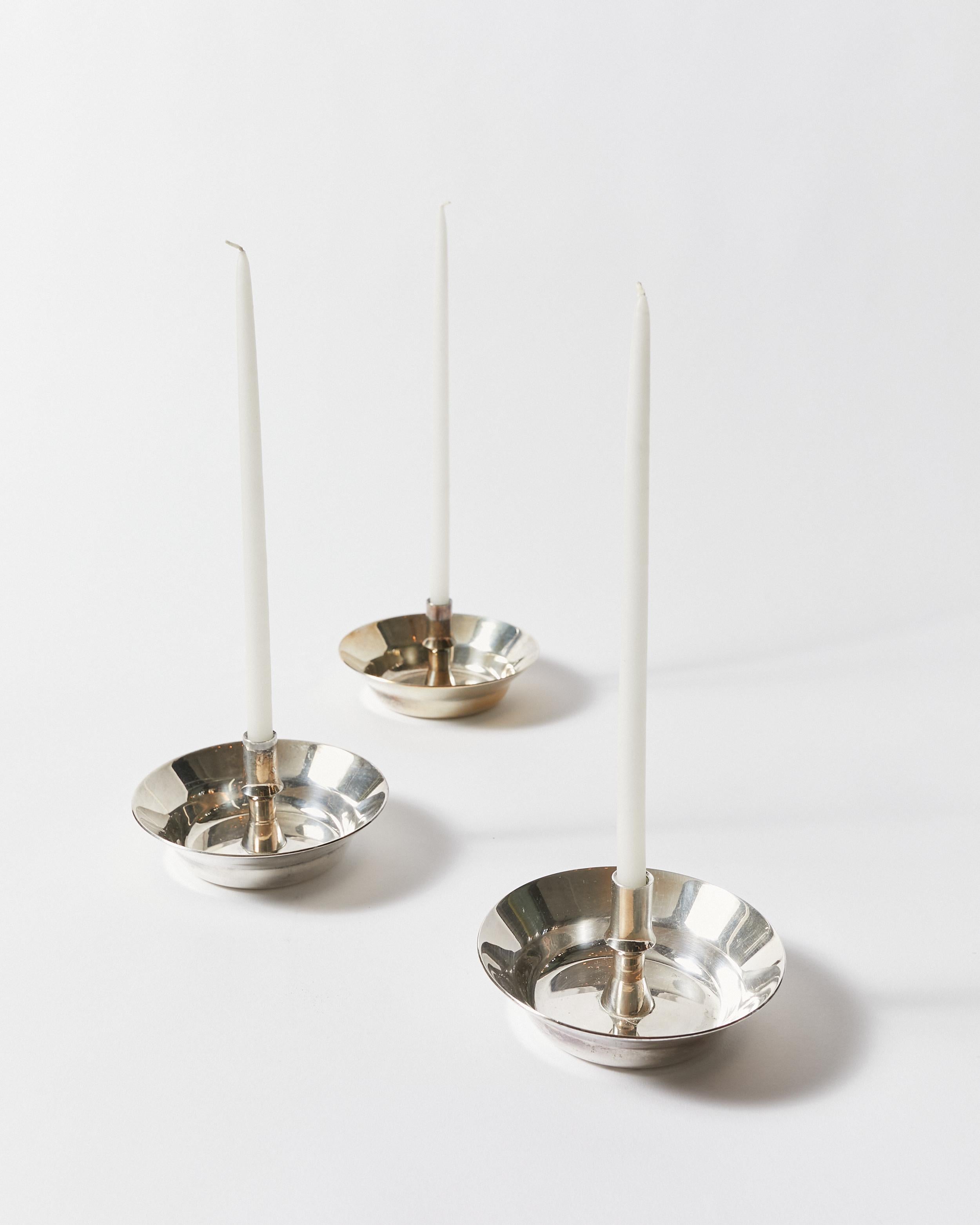 Silvered Set of Nine Candle Holders by Jens H. Quistgaard for Dansk Design For Sale