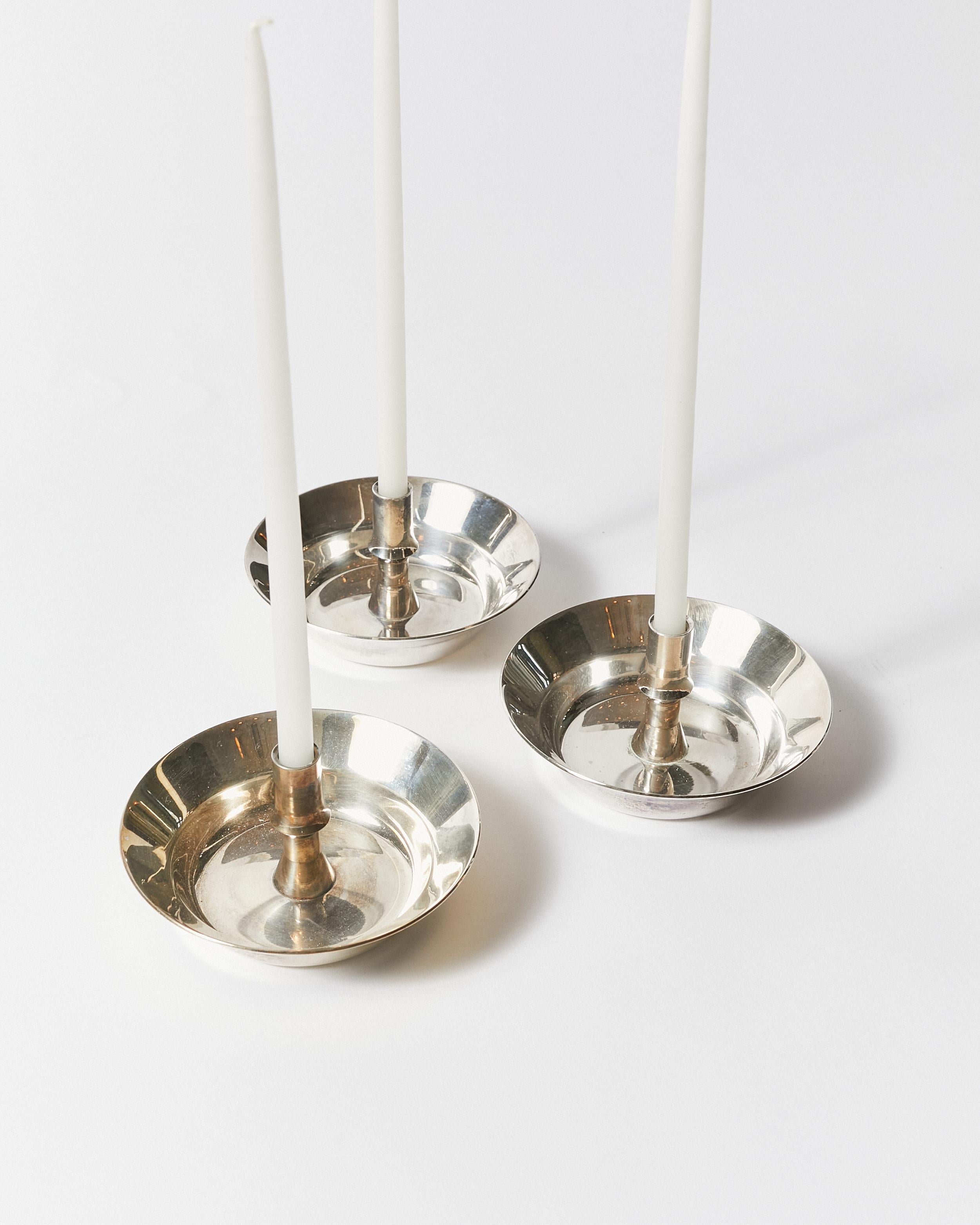 Set of Nine Candle Holders by Jens H. Quistgaard for Dansk Design In Good Condition For Sale In Philadelphia, PA