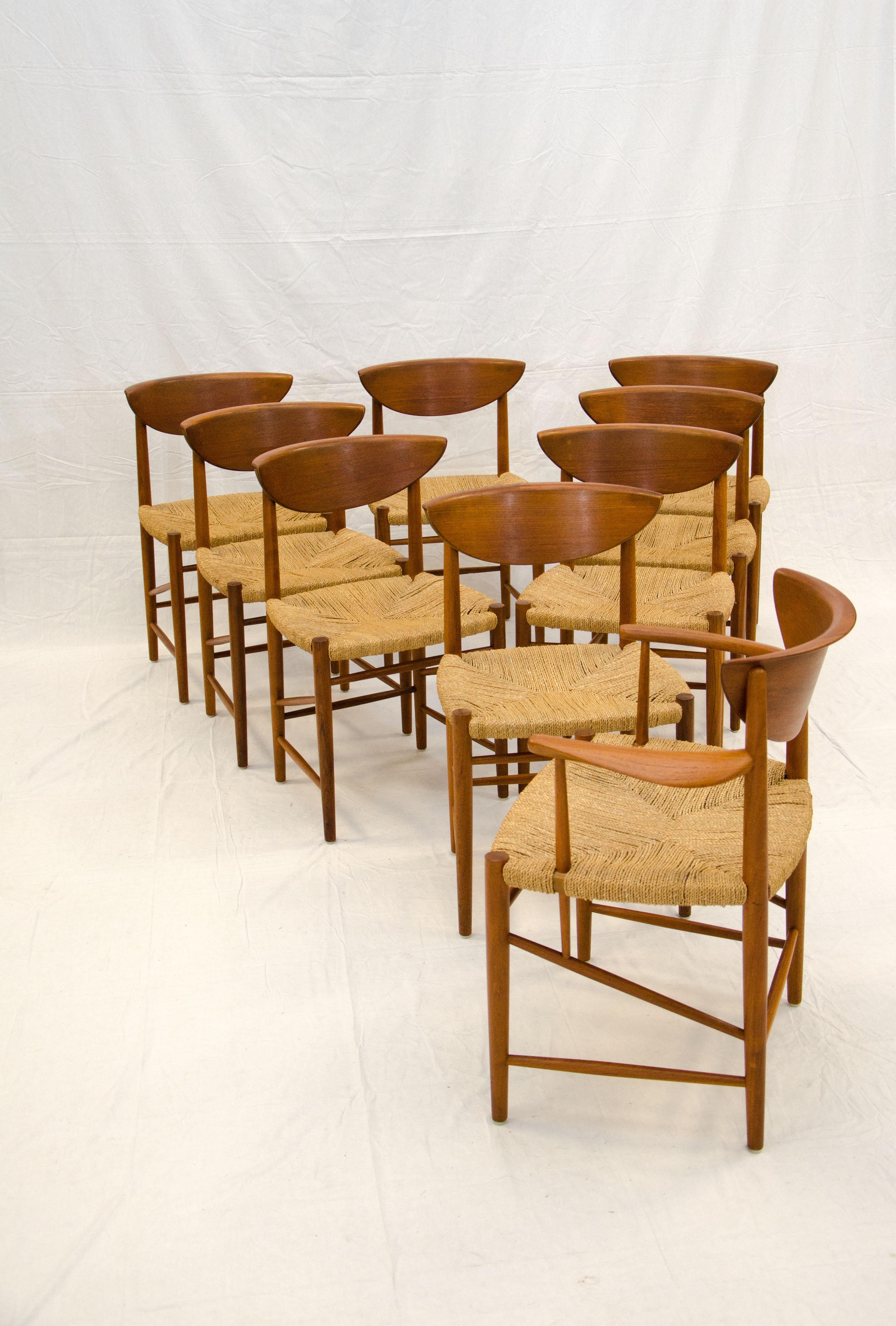 A beautiful set of Danish teak dining chairs by renowned designer Peter Hvidt manufactured by Soborg Mobler. A rare find in this excellent condition with original finish and original woven seagrass seats, without loose cords or staining. The arms