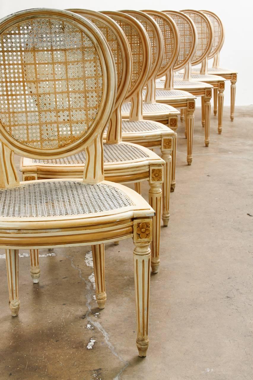 French Set of Nine Louis XVI Lacquered Caned Dining Chairs