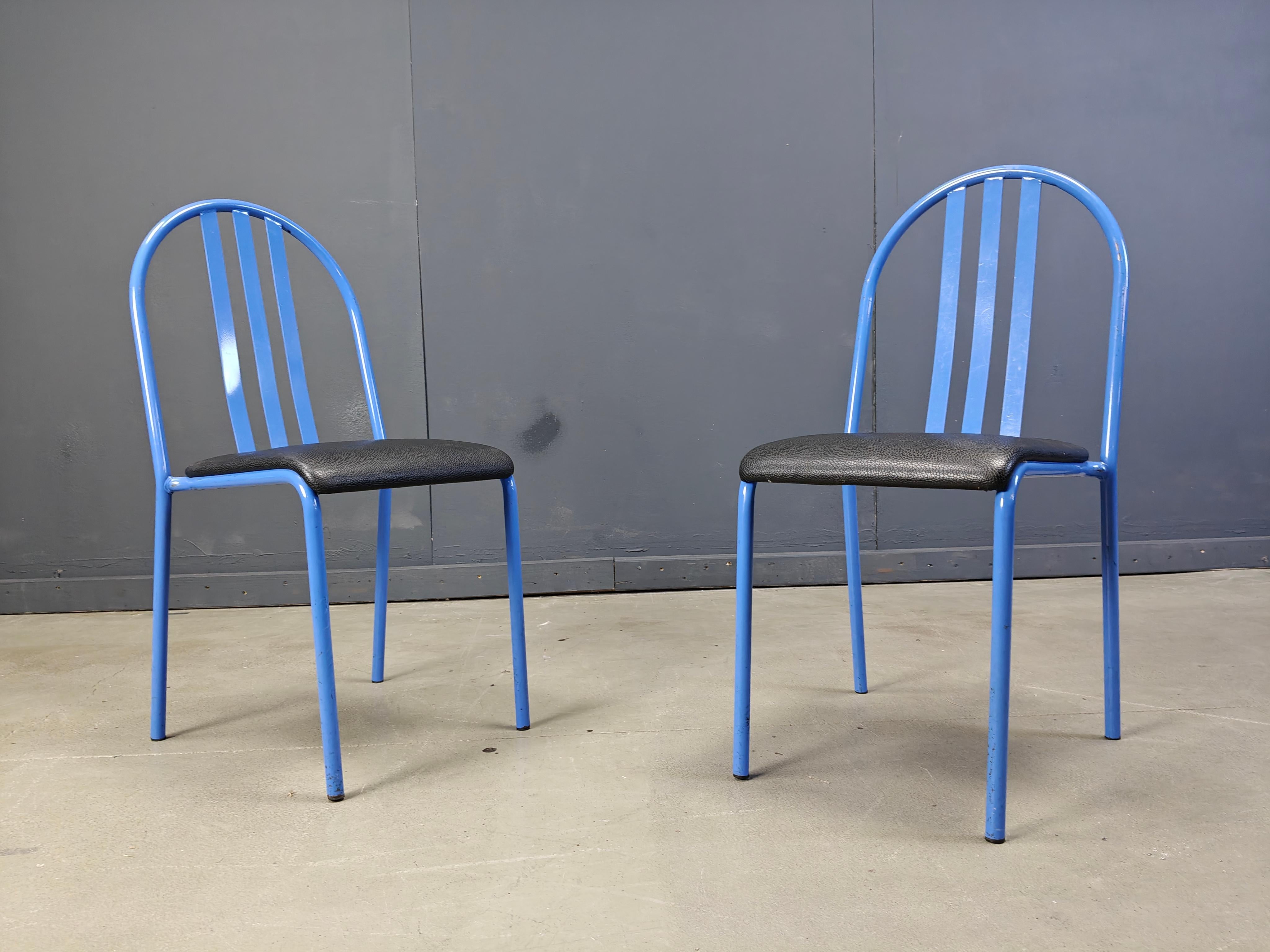 These stackable chairs were designed by French modernist architect Robert Mallet-Stevens (1886-1945).
They were fabricated in France in 1928 by Ecart.
Made in Italy by Pallucco, c. 1980s.

Blue metal frames with black skai upholstery.

Good overall