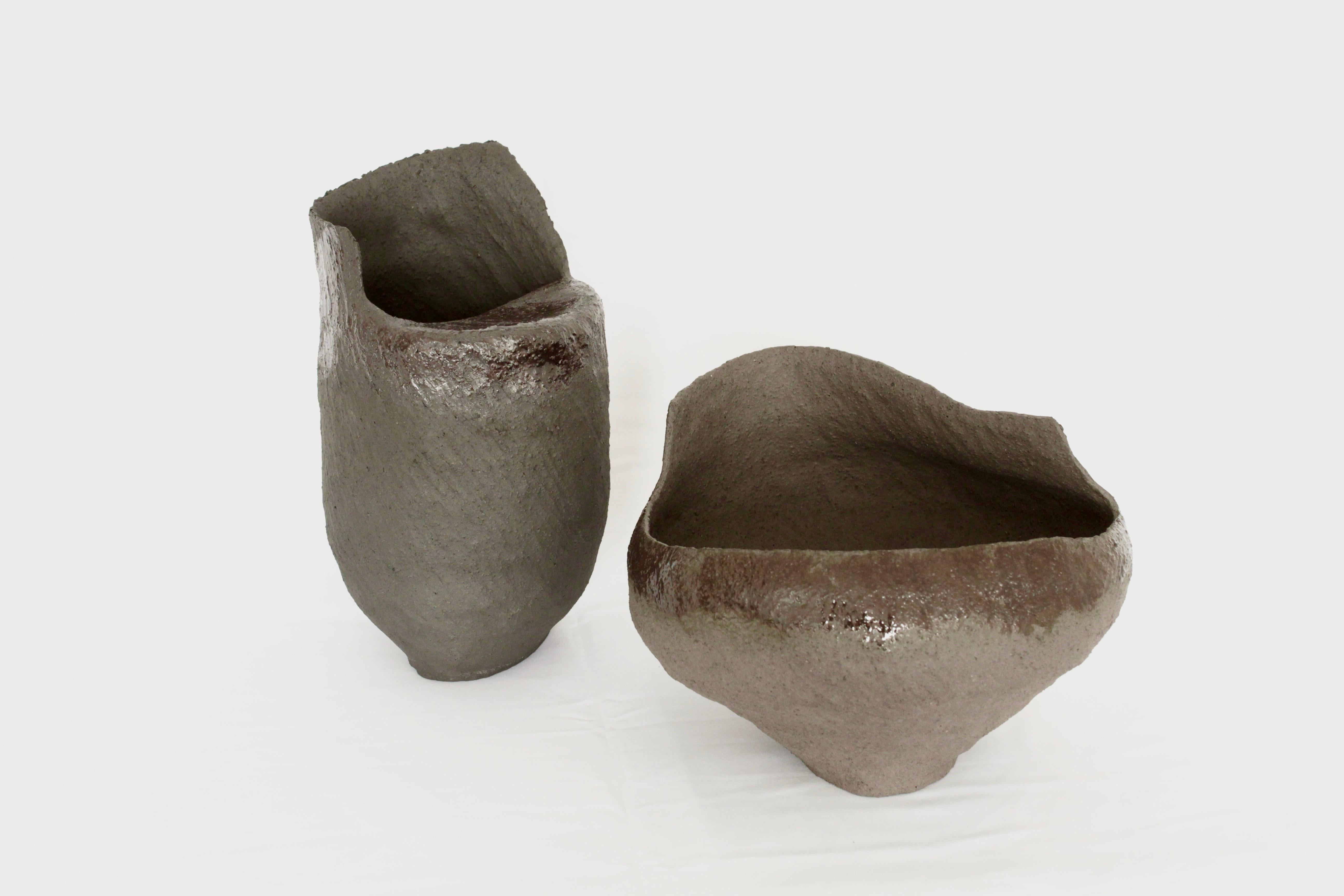 Set of October's Vases 01 and 02 by Cécile Ducommun
Dimensions: D21 x H35 cm and D31 x 23 cm
Materials: Stoneware.

Hand modeled stoneware, fired at 1250 degrees. May contain water.

