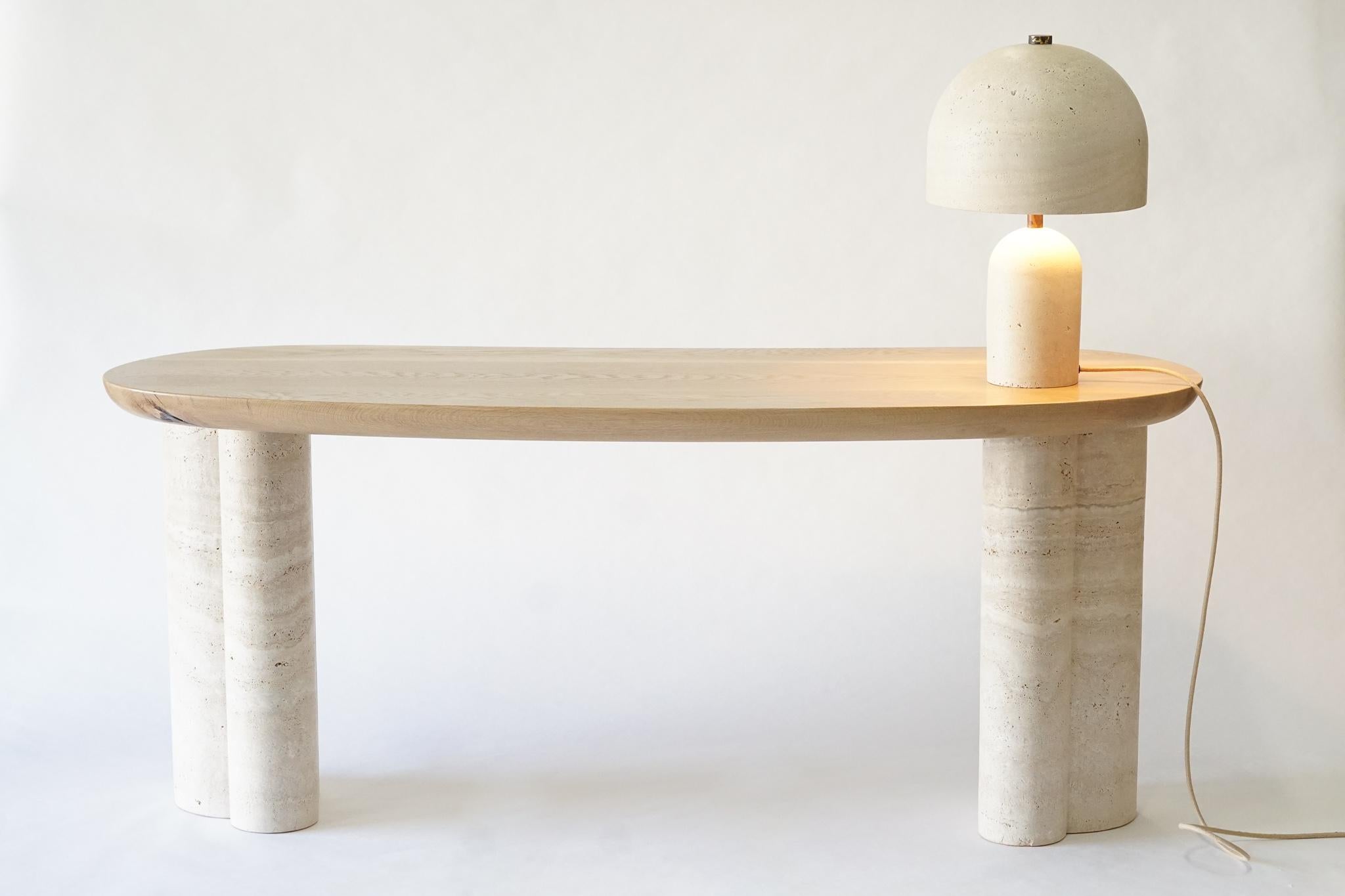 Set of Onna desk and table lamp by Swell Studio
Dimensions: D 153 x W 76 x H 76 cm 
Materials: alabastrino travertine and white oak.
Also available in variety of finish options. 

The Onna desk is the second edition to our ever expanding Onna