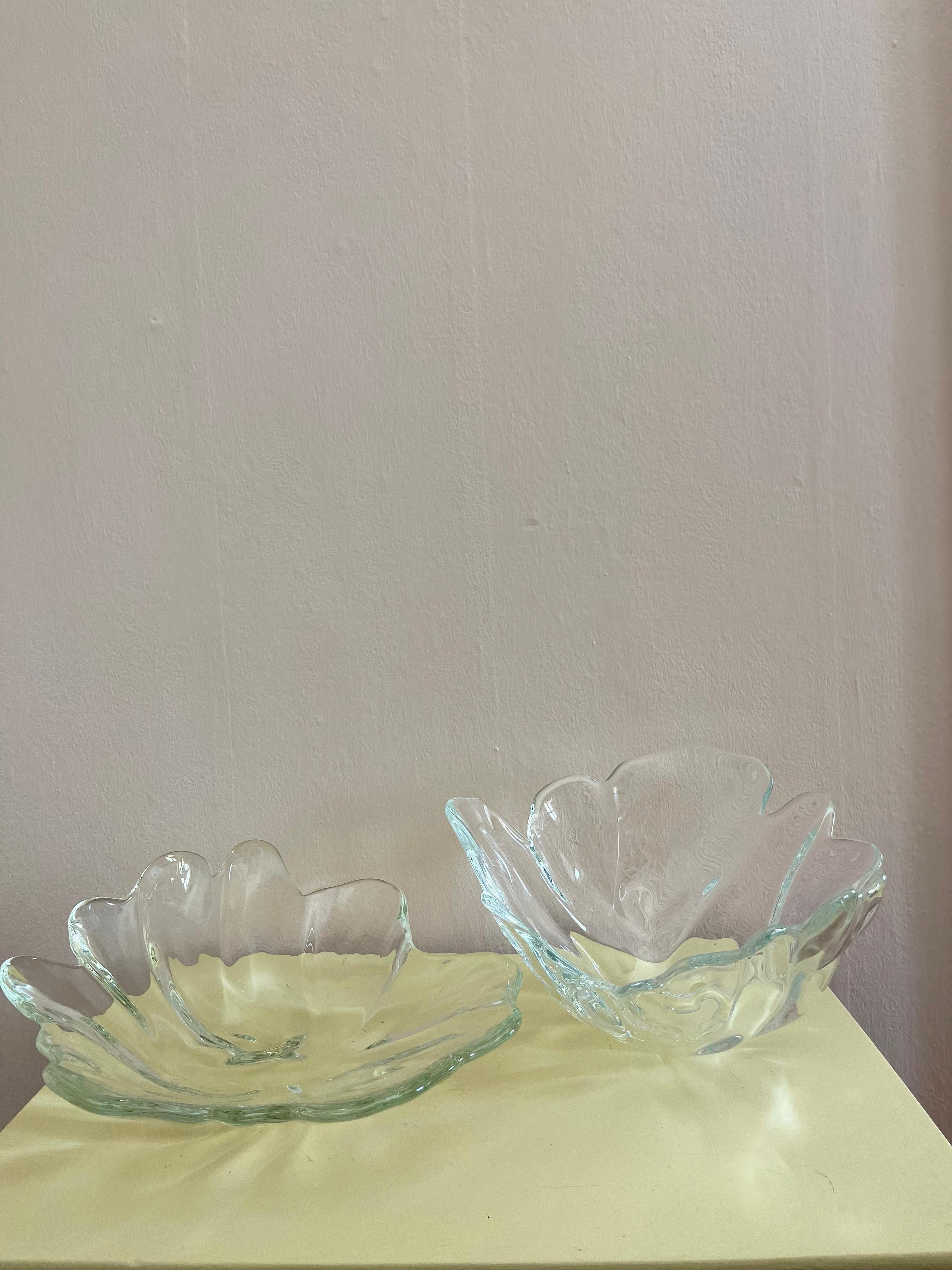 Set of organic shaped dishes by Ole Kortzau for Holmegaard in heavy glass

Set of organic shaped dishes by Ole Kortzau for Holmegaard in heavy glass. From the series Natura created in Denmark in 1996. Both in good condition, no flaws. 

The lower