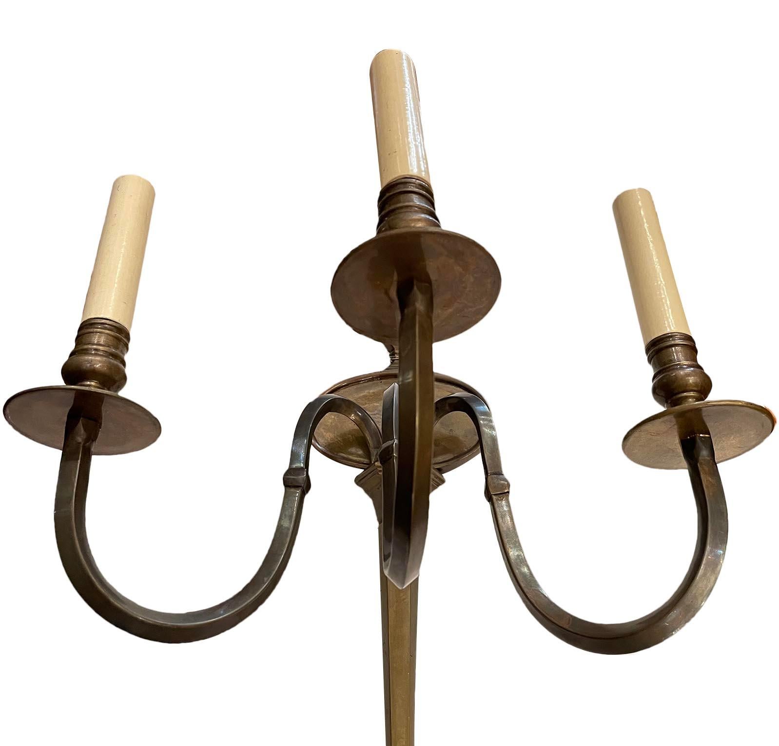 A set of four circa 1930s English neoclassic style patinated bronze lights sconces. Sold per pair.

Measurements:
Height 15