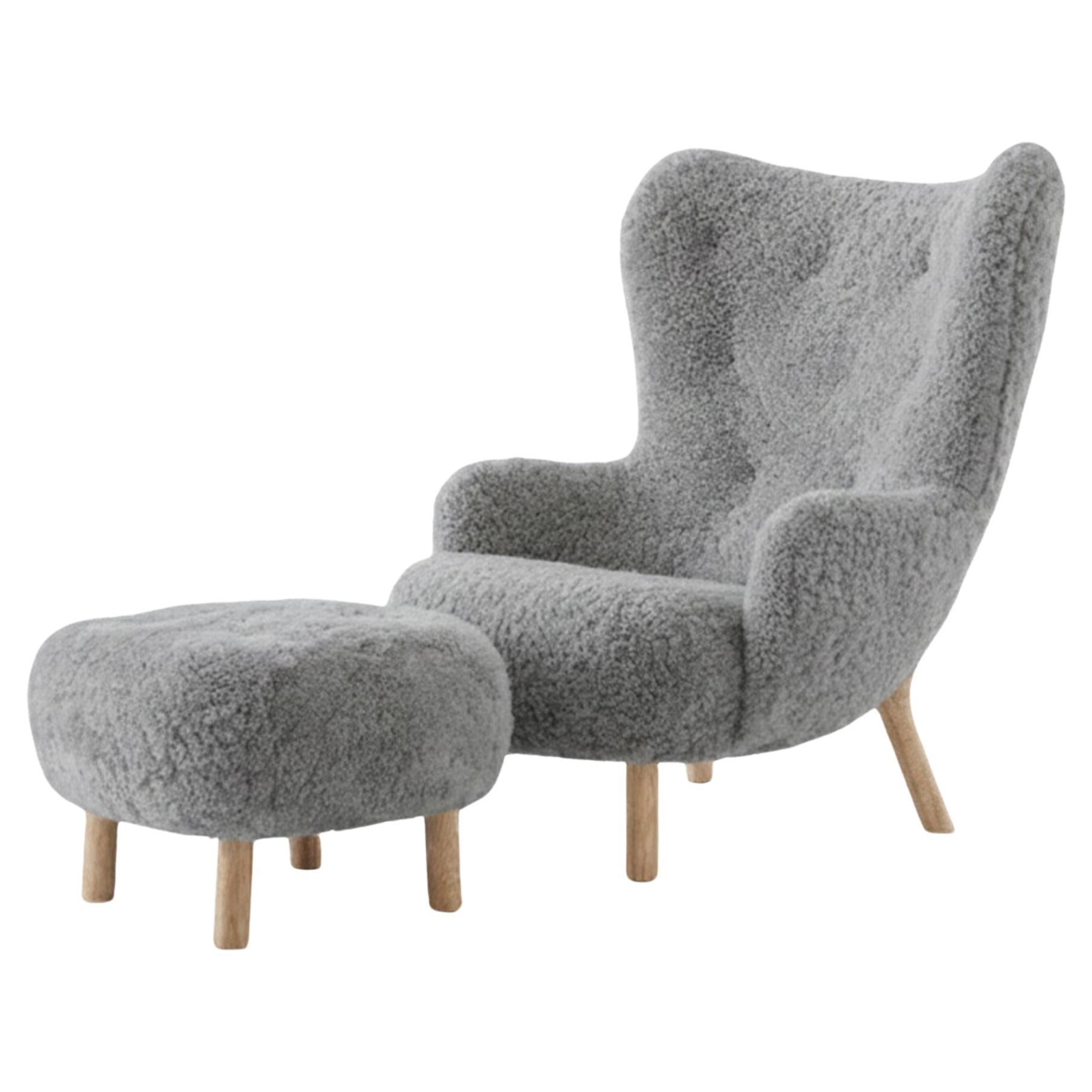 Set of Petra Lounge Chair 
Pouf in Scandinavian Grey 22 Sheepskin 17mm/Oak For Sale
