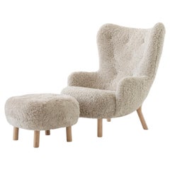 Set of Petra Lounge Chair & Pouf-Sheepskin Moonlight/Oak- by Viggo Boesen for &T