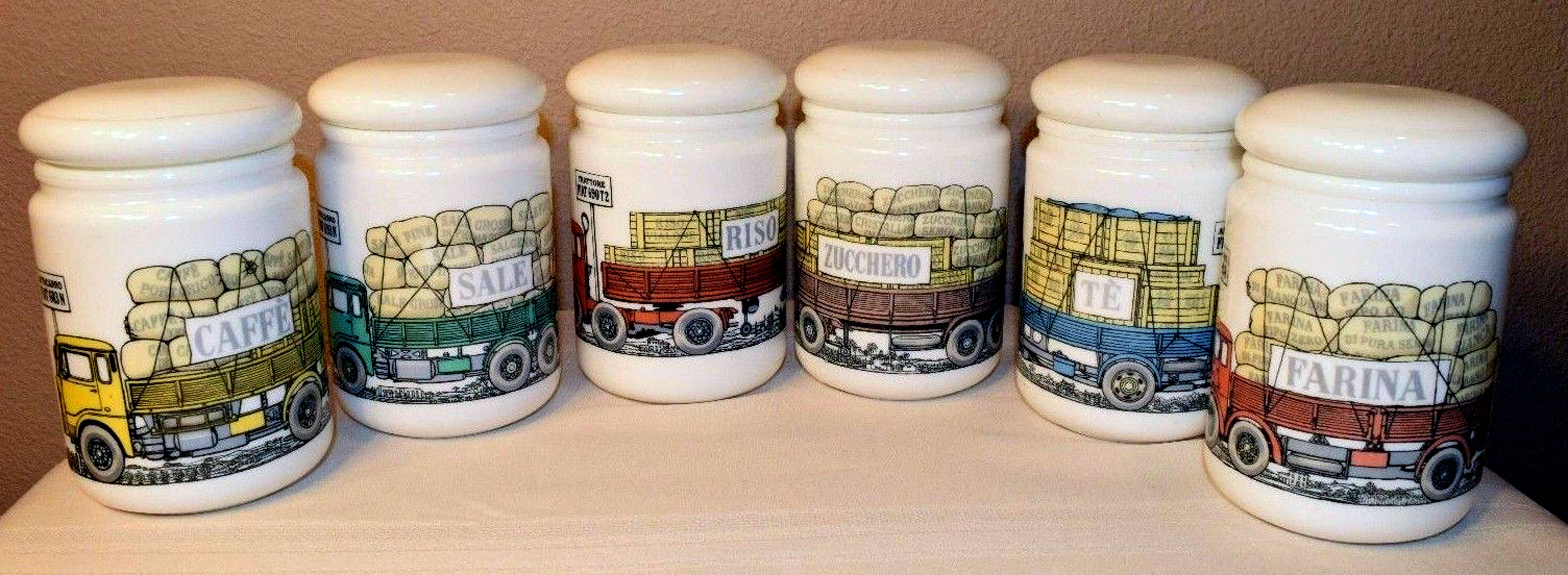 Vintage Trucks!

Piero Fornasetti opaque white glass jars and covers with trucks or lorry motif made for Fiat, Six Jars, 
circa 1960.

The truck-motif glass jars with lids were made for the Fiat Motor Company as promotional pieces- part of a