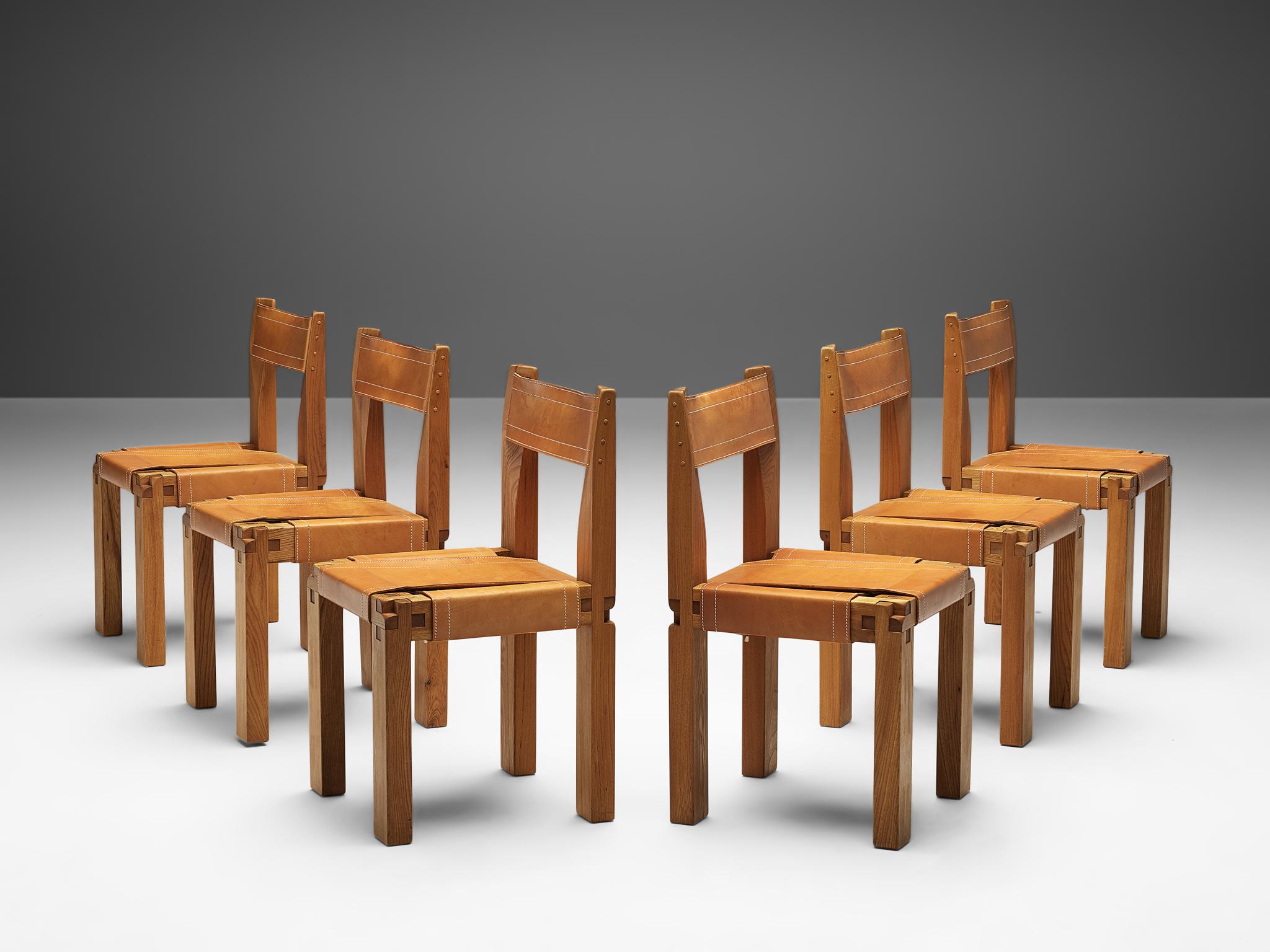 Pierre Chapo, set of six dining chairs, model S11, elm and leather, France, circa 1966. 

A set of six chairs in solid elmwood with black saddle leather seating and back, designed by French designer Pierre Chapo. These chairs have a cubic design