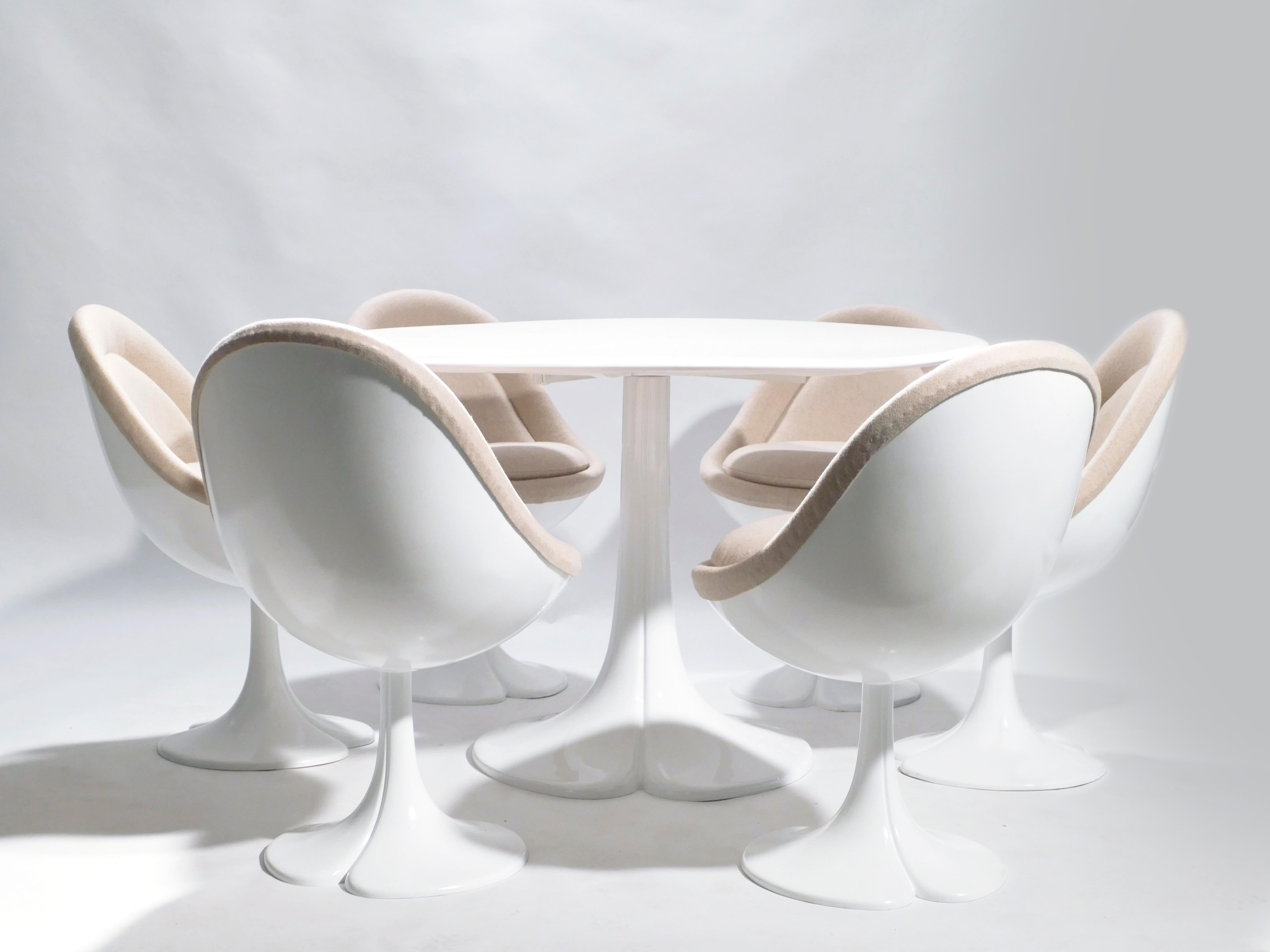 French designer Pierre Paulin was most known for his chairs, which featured comfortable, body-conforming curves and soft materials, as seen here. This set of a dining table and six chairs is emblematic of Paulin’s work for Dutch furniture company