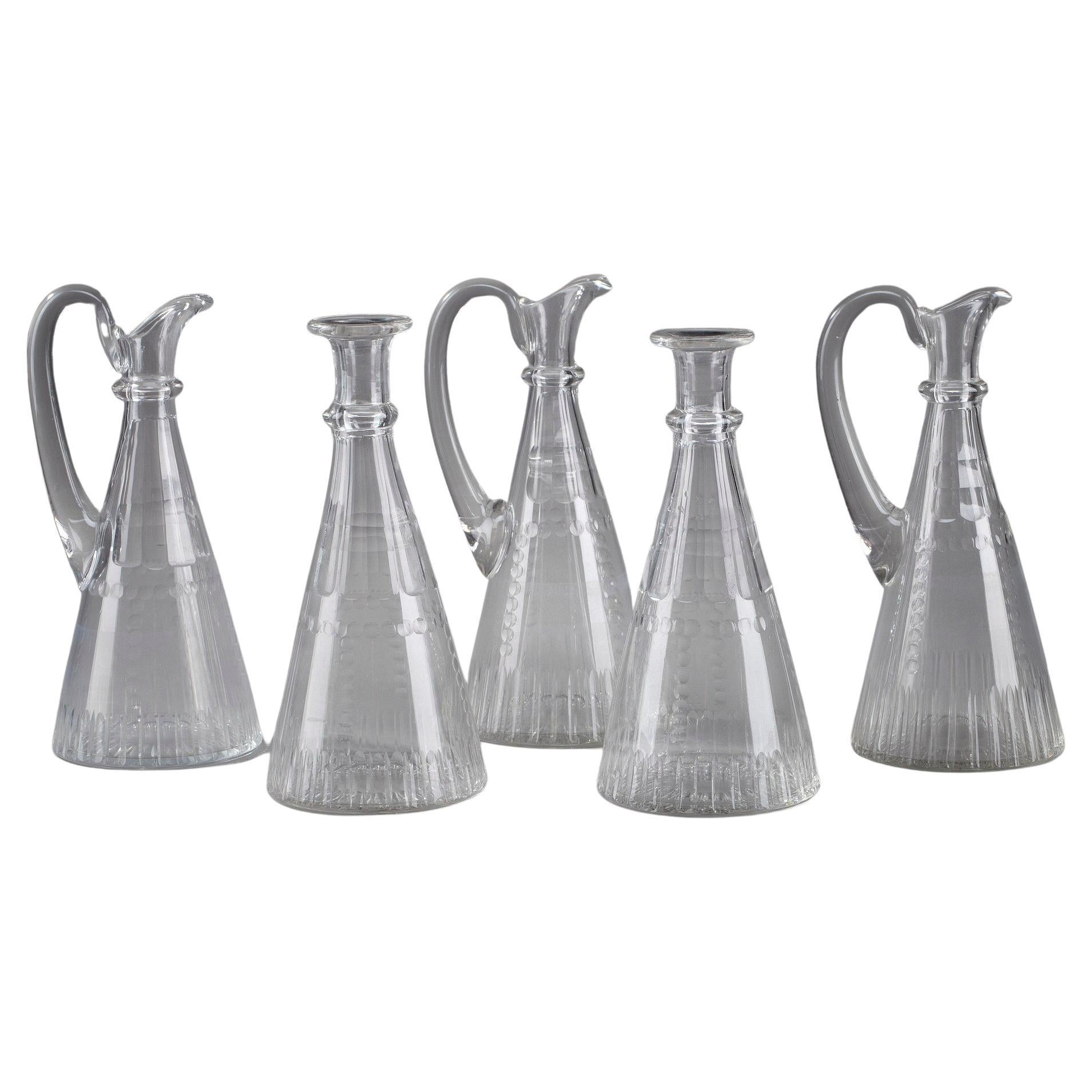 Set of Pitchers and Decanters in Molded Glass For Sale