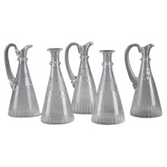 Antique Set of Pitchers and Decanters in Molded Glass