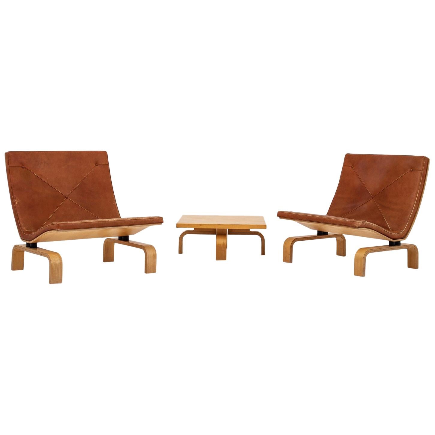 Set of PK 27 Chairs and Table by Poul Kjærholm. 