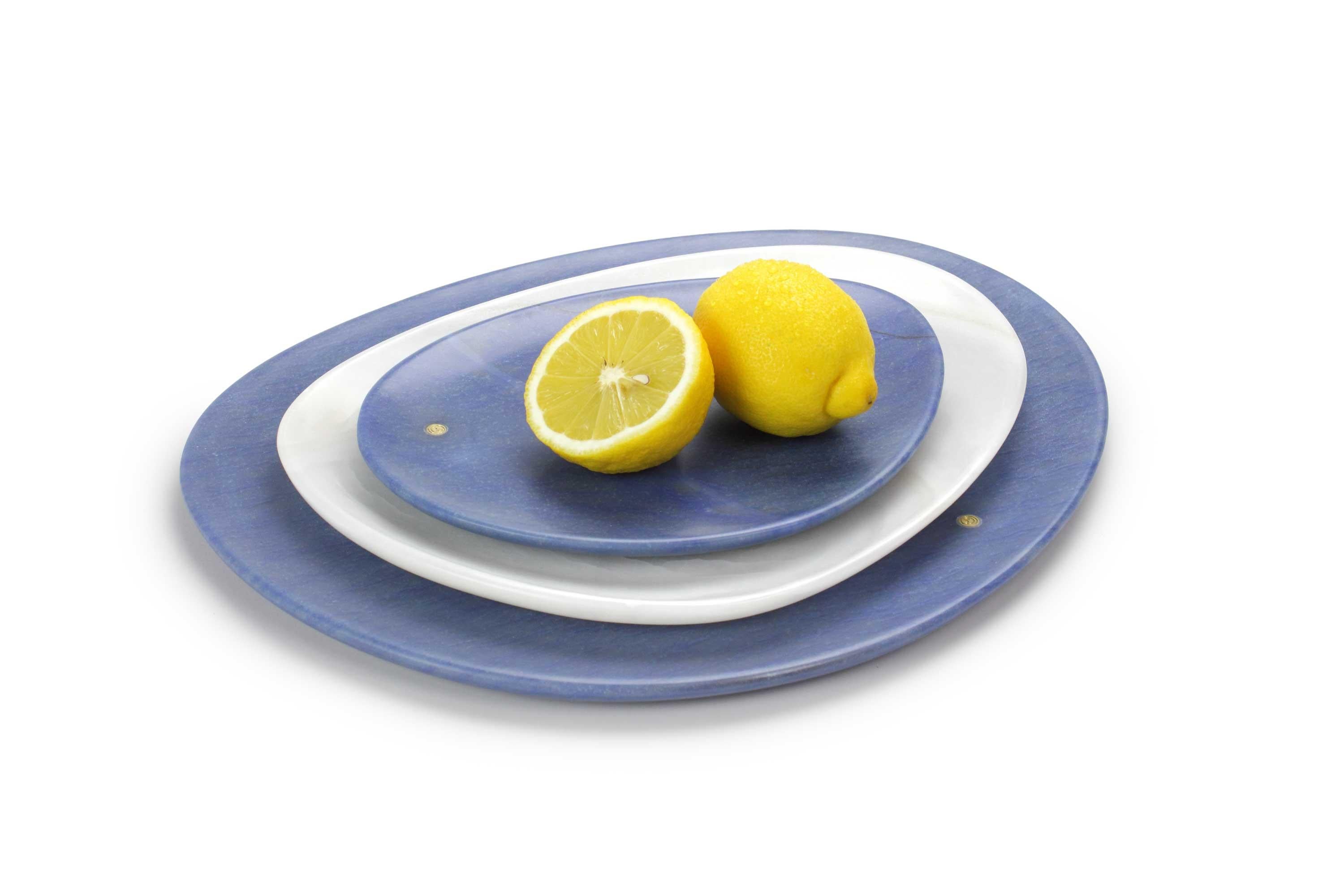 Hand carved presentation plates in extra blue Azul Macaubas and white onyx. Polished finishing. Multiple use as plates, platters and placers. 

Dimensions: Small – L 24, W 20, H 1.8 cm, medium – L 30, W 28, H 1.8 cm, big – L 36, W 35, H 1.8