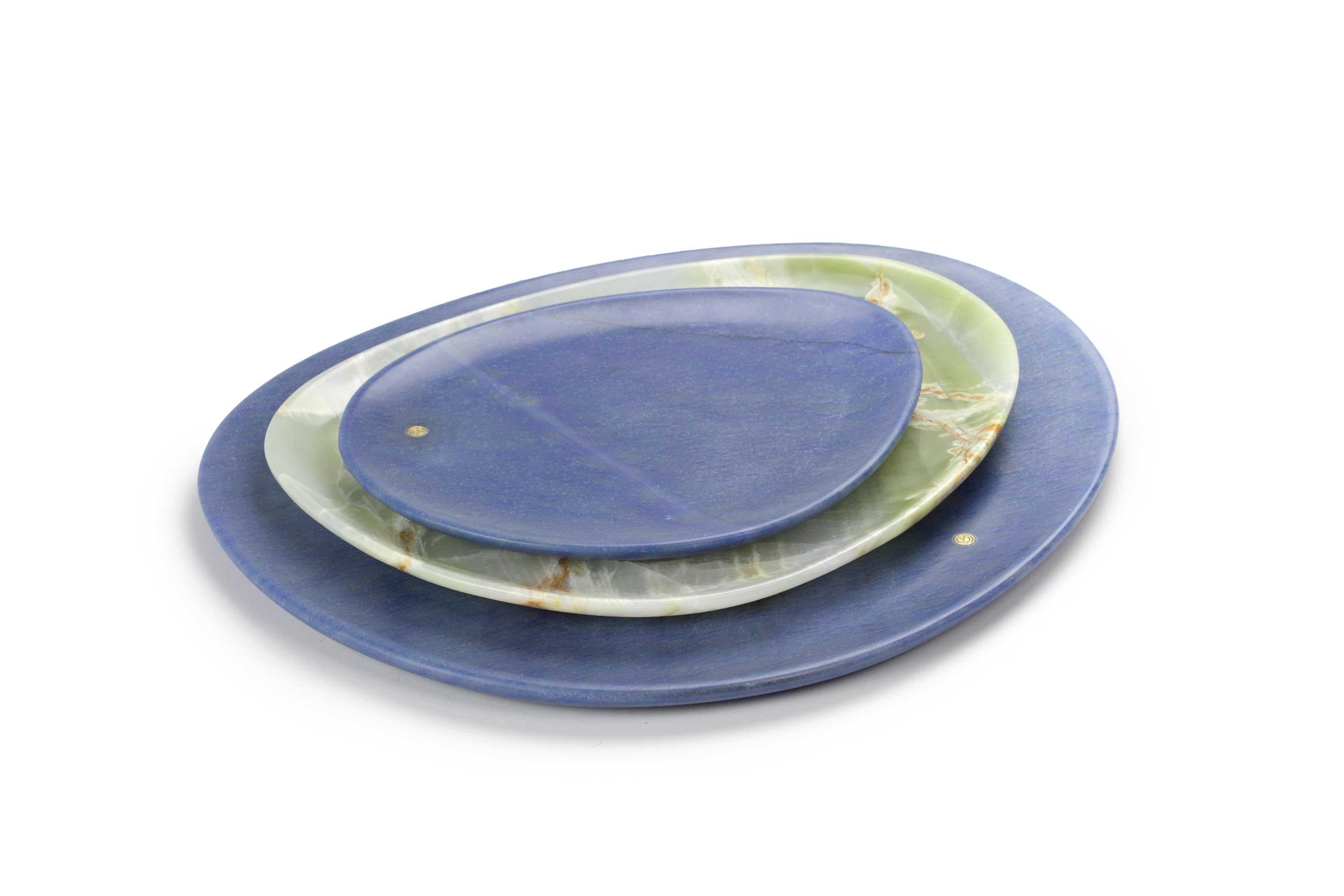 Hand carved presentation plates in extra blue Azul Macaubas and green onyx. Polished finishing. Multiple use as plates, platters and placers. 

Dimensions: Small - L24 W20 H1.8 cm, Medium - L30 W28 H1.8 cm, Big - L36 W35 H1.8 cm.
Available in