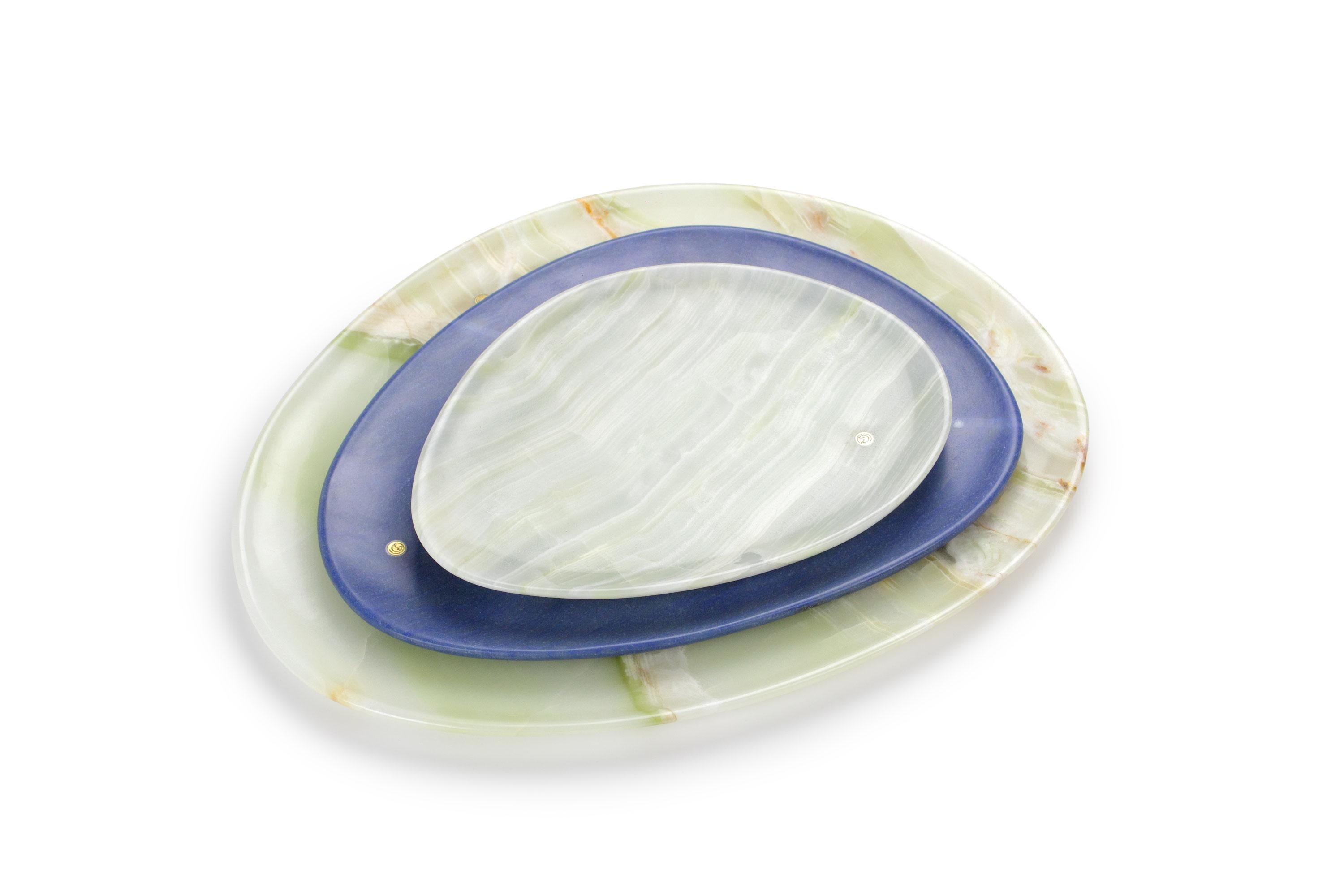 Hand carved presentation plates in green onyx and Azul Macaubas. 
Multiple use as plates, platters and placers. 

Dimensions: Small - L 24 W 20 H 1.8 cm, Medium - L 30 W 28 H 1.8 cm, Big - L 36 W 35 H 1.8 cm.
Available in different marbles, onyx and