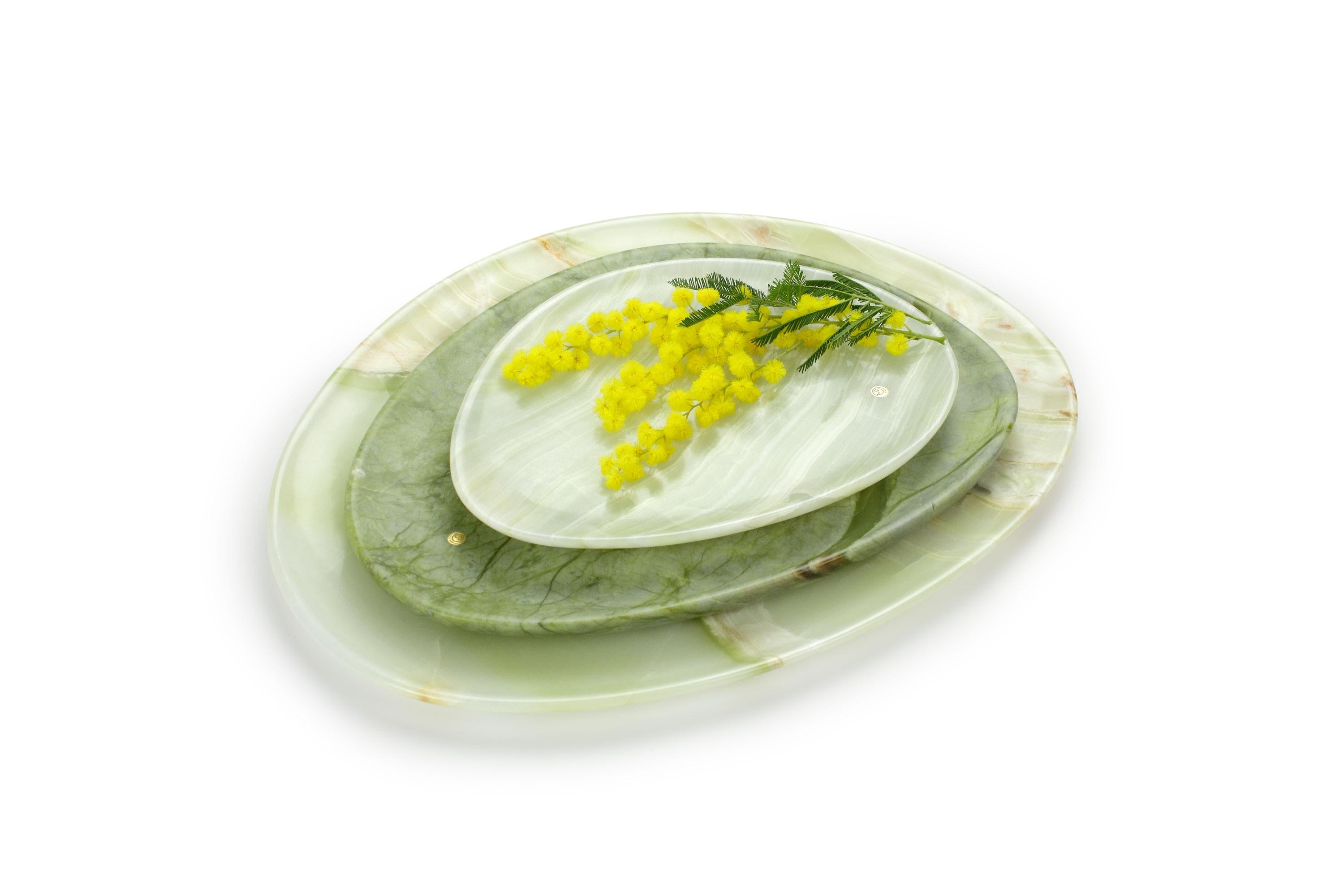 Hand carved presentation plates in green onyx and Green Ming. 
Multiple use as plates, platters and placers. 

Dimensions: Small - L 24 W 20 H 1.8 cm, Medium - L 30 W 28 H 1.8 cm, Big - L 36 W 35 H 1.8 cm.
Available in different marbles, onyx and
