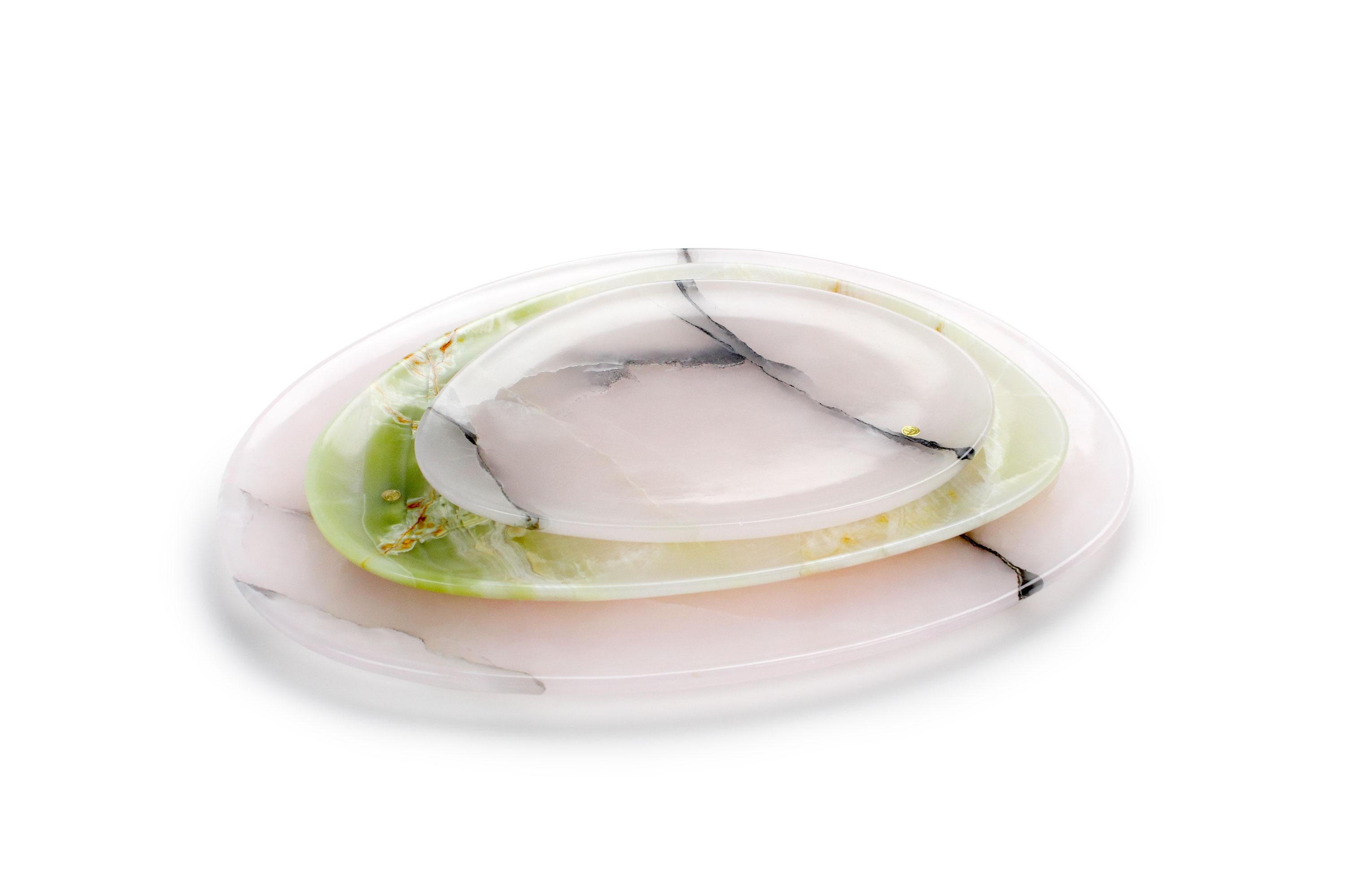 Hand carved presentation plates in green onyx and pink onyx. 
Multiple use as plates, platters and placers. 

Dimensions: Small - L 24 W 20 H 1.8 cm, Medium - L 30 W 28 H 1.8 cm, Big - L 36 W 35 H 1.8 cm.
Available in different marbles, onyx and