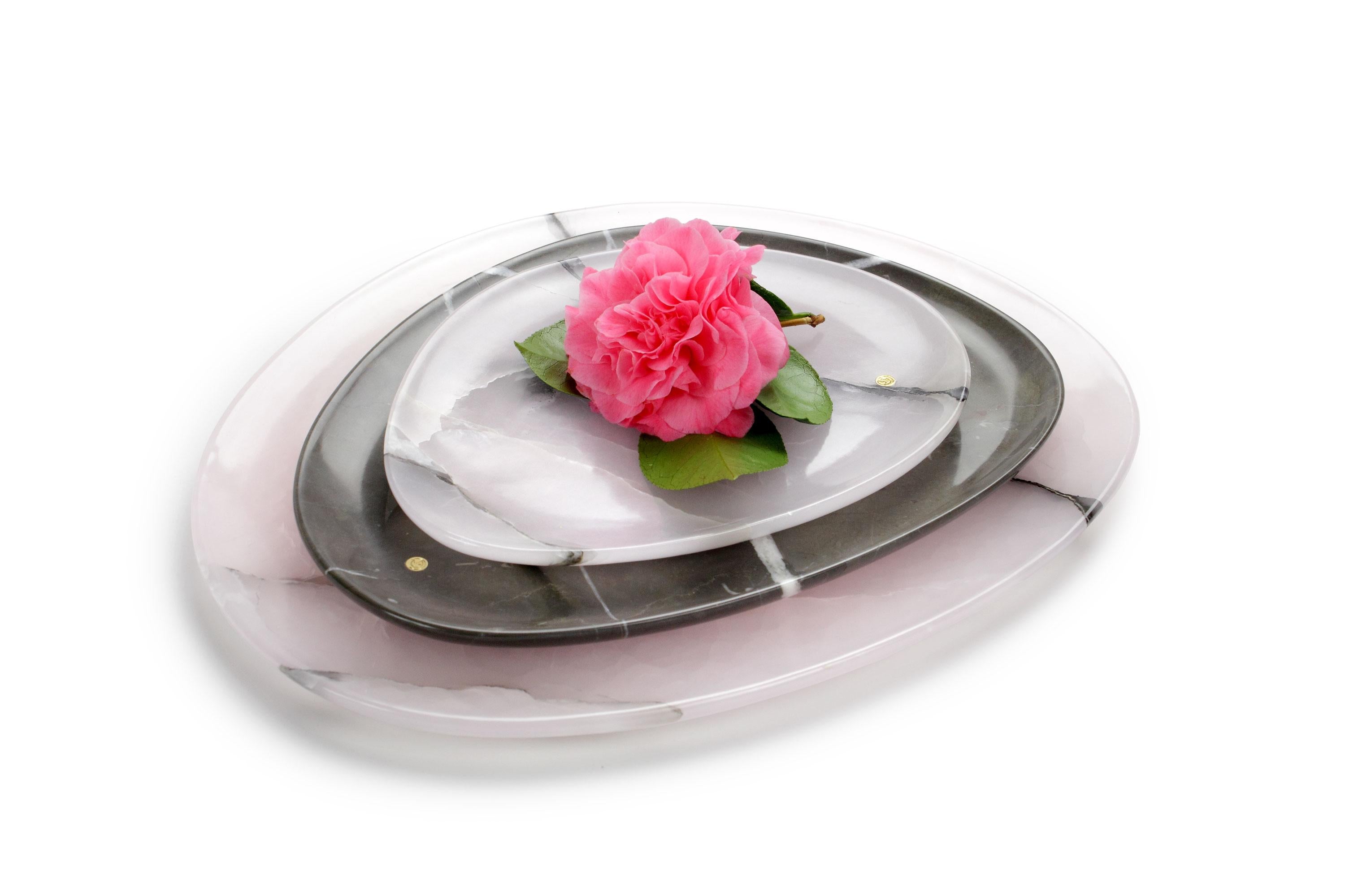 Hand carved presentation plates in pink onyx and imperial grey marble. 
Multiple use as plates, platters and placers. 

Dimensions: Small - L24 W20 H1.8 cm, Medium - L30 W28 H1.8 cm, Big - L36 W35 H1.8 cm.
Available in different marbles, onyx and