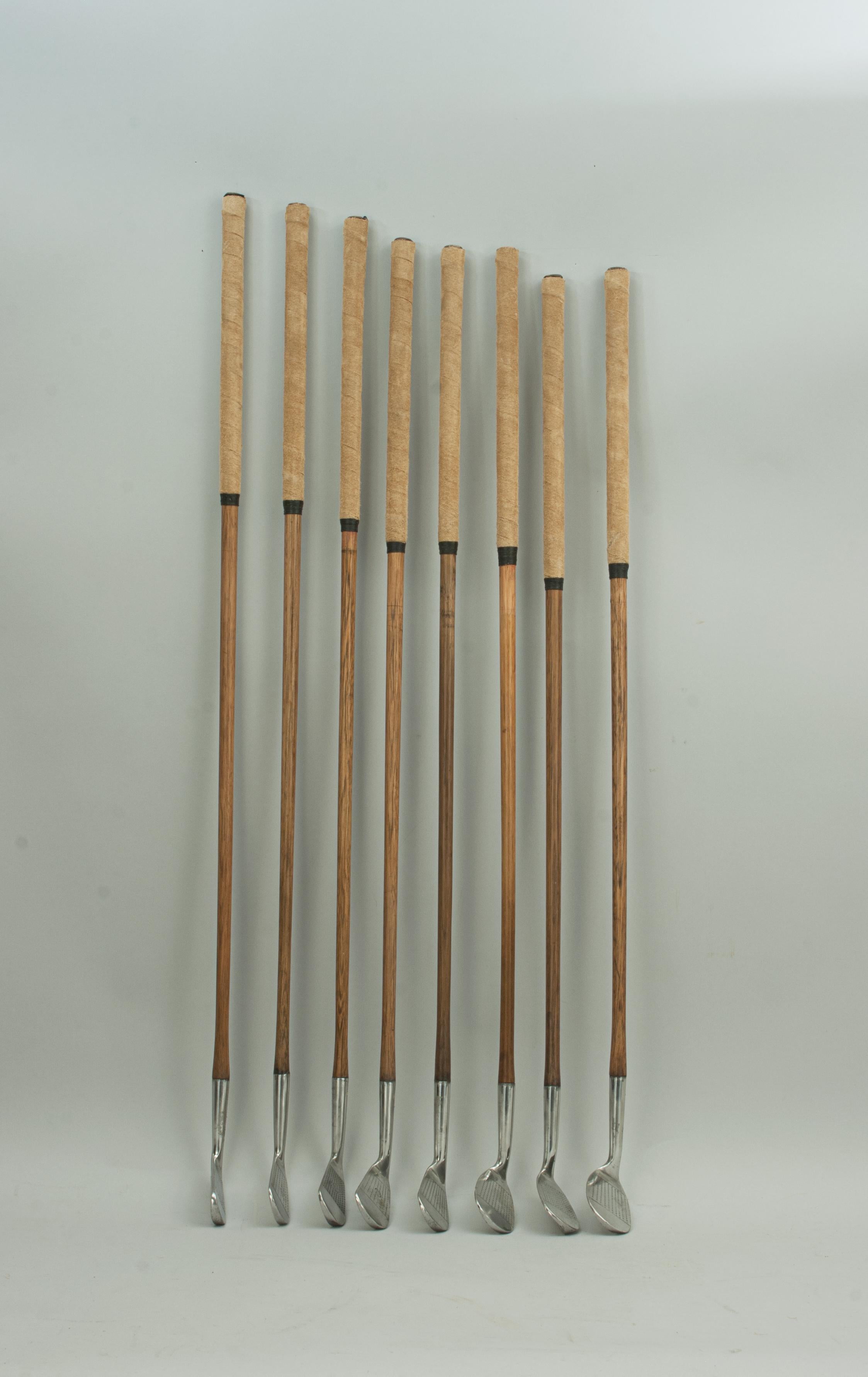 Set of eight playable LB Hickory Golf Clubs.
A very good matched set of eight hickories (hickory shafted golf clubs) retailed by 'LB' of 76 Jermyn Street, London. The set is made up of all irons and include a Cleek, No. 1, 2 & 5, Mashie, two
