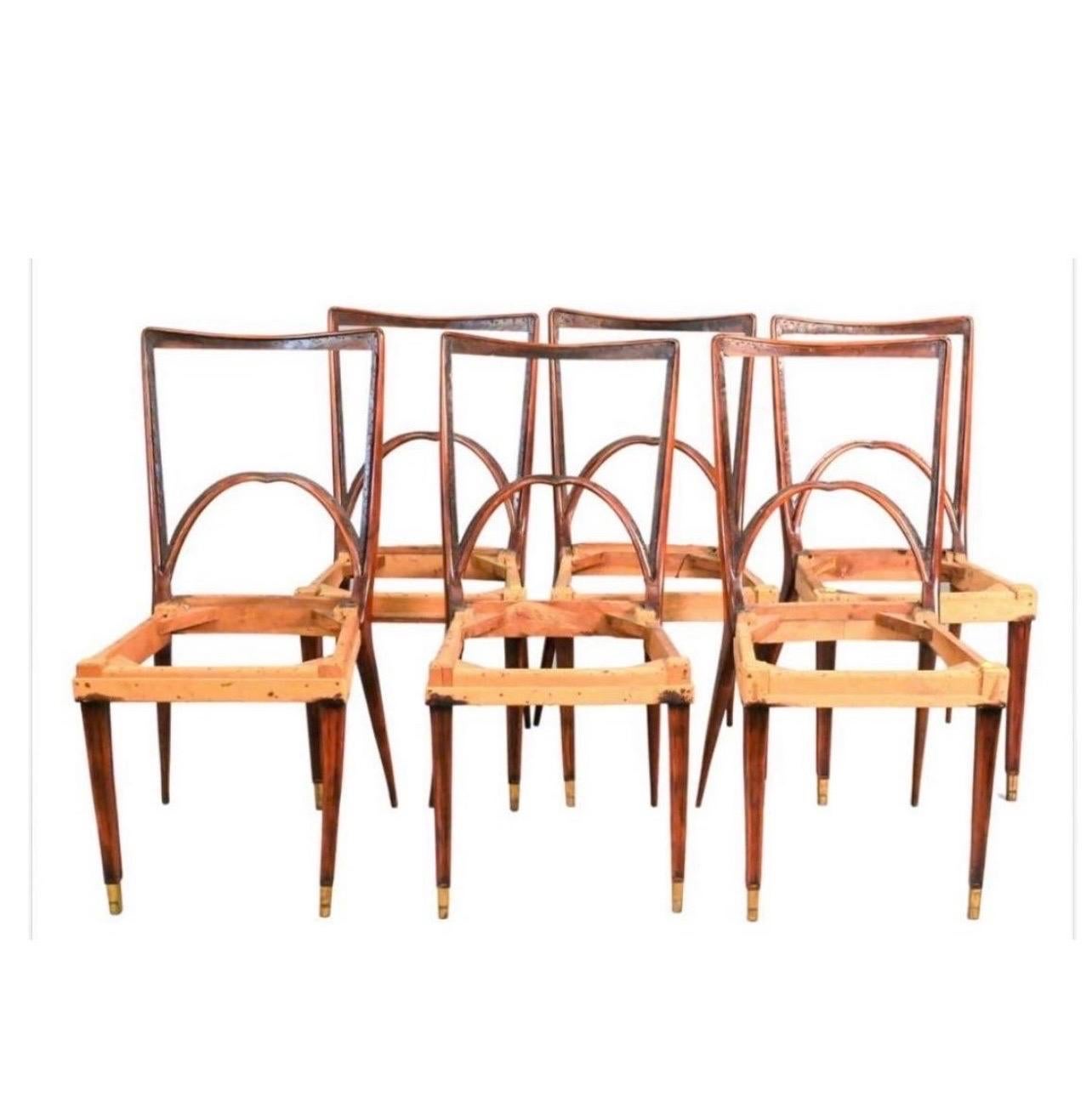 Stunning mid century Italian dining chairs featuring a graceful rosewood frame and brass tips on feet, see pics. 
Note buyer would need to have seats and backrests upholstered as they are currently bare - again see pics. While these have no makers