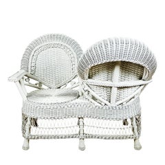 Set of Rattan loveseat and table – France 1970