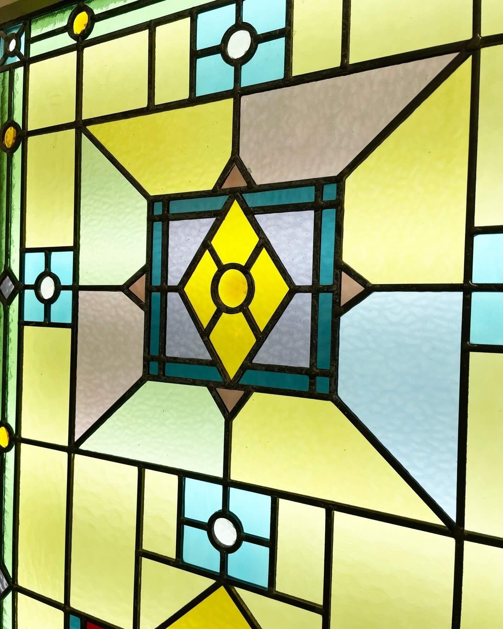 A vibrant set of large Edwardian style reclaimed stained glass double doors, perfect for period homes and modern properties alike.

Constructed in pine, these beautiful double doors date from the 1950s with later double glazing, making them