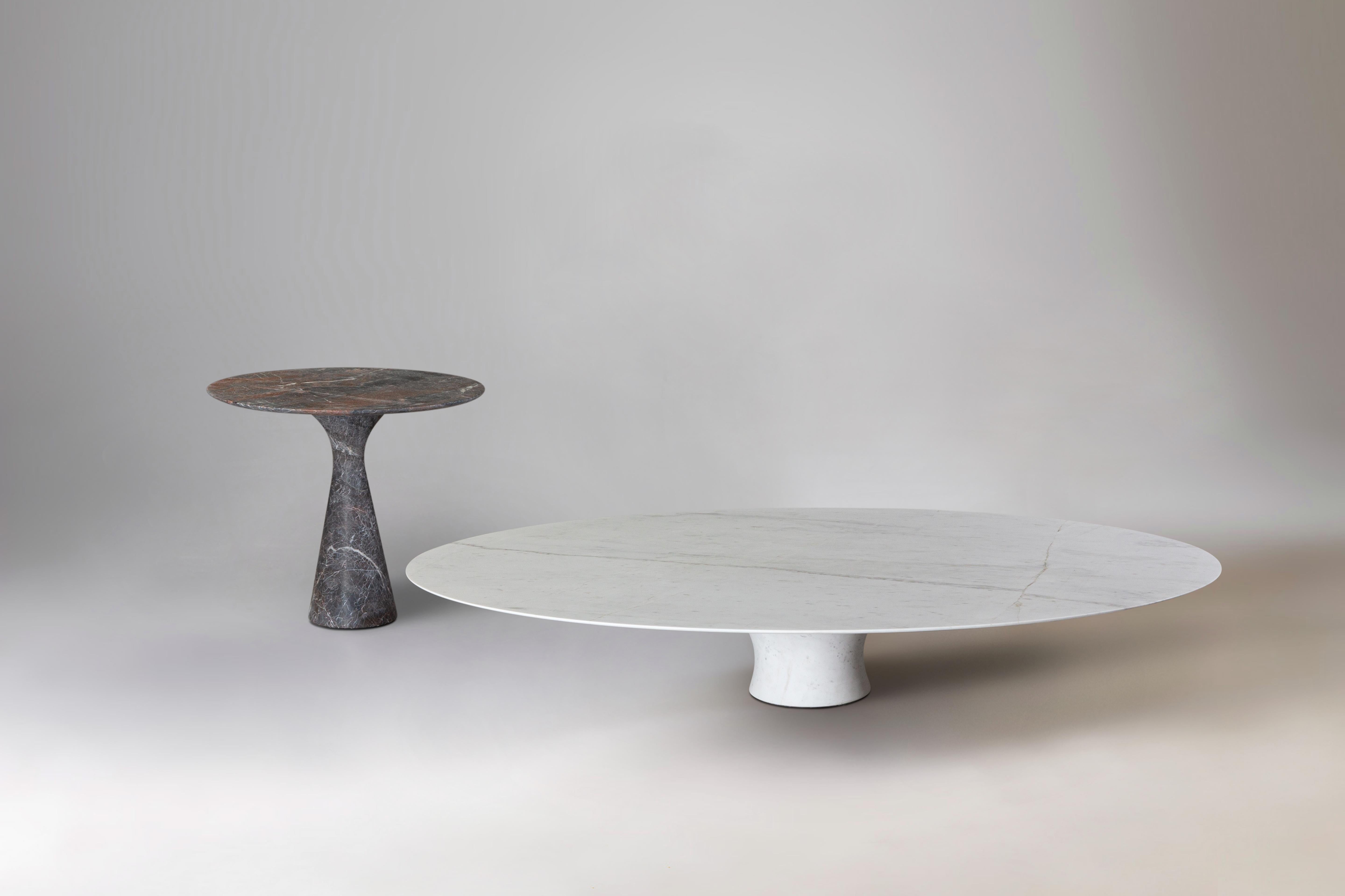 Set of Refined Contemporary Marble Oval Low Table and Side Table
Dimensions: 130 x 27 cm/ 45 x H 62 cm 
Materials: Kynos, Grey Saint Laurent

Angelo is the essence of a round table in natural stone, a sculptural shape in robust material with elegant