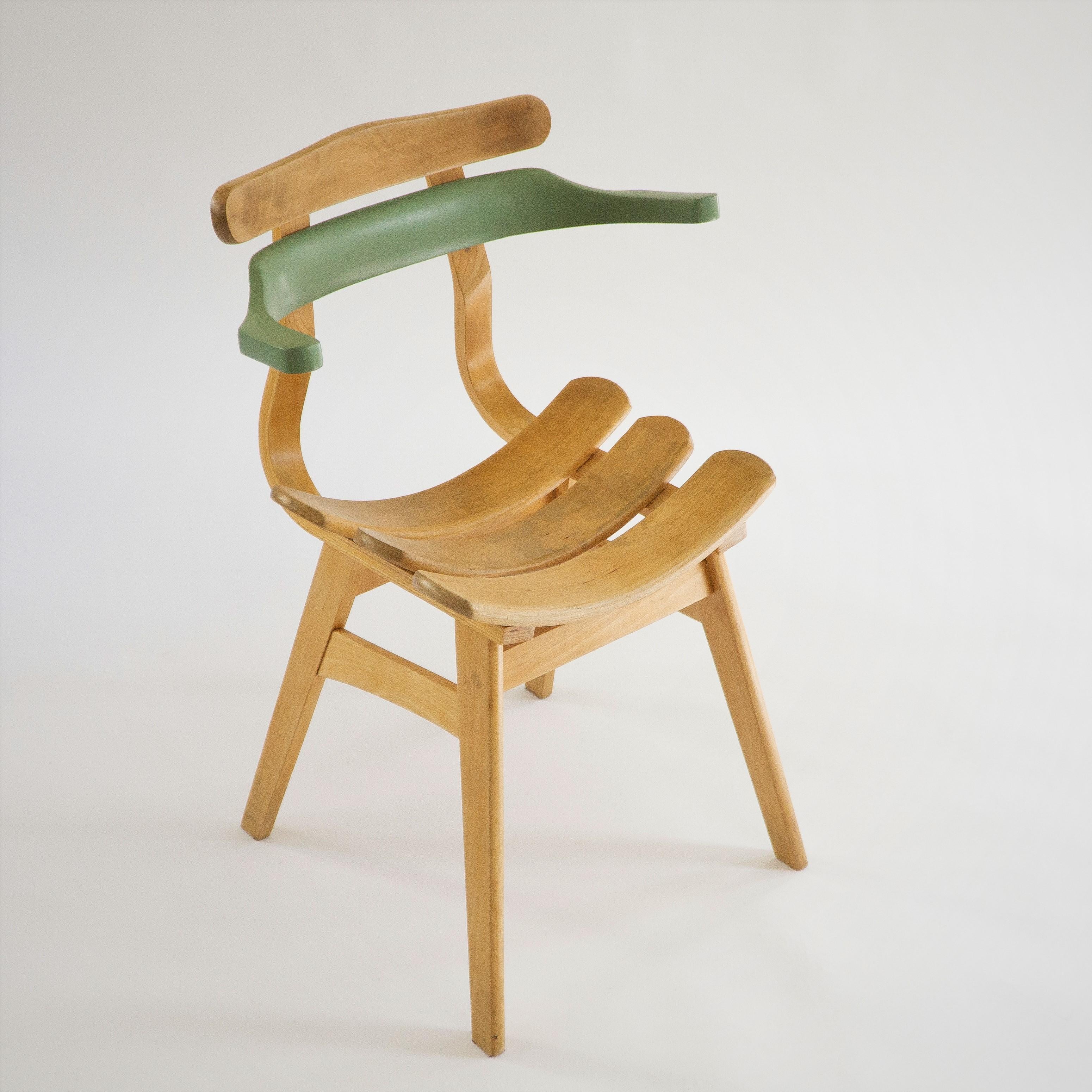 The Green Line Chairs is a unique set of living room or dining room chairs, upcycled by PUNKT Workshop from part of many different reinvented vintage chairs.

The Green Line Chairs is a handcrafted set of reclaimed solid wood accent chairs,