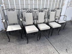 Set of Rene Prou dining room Chairs and Armchairs