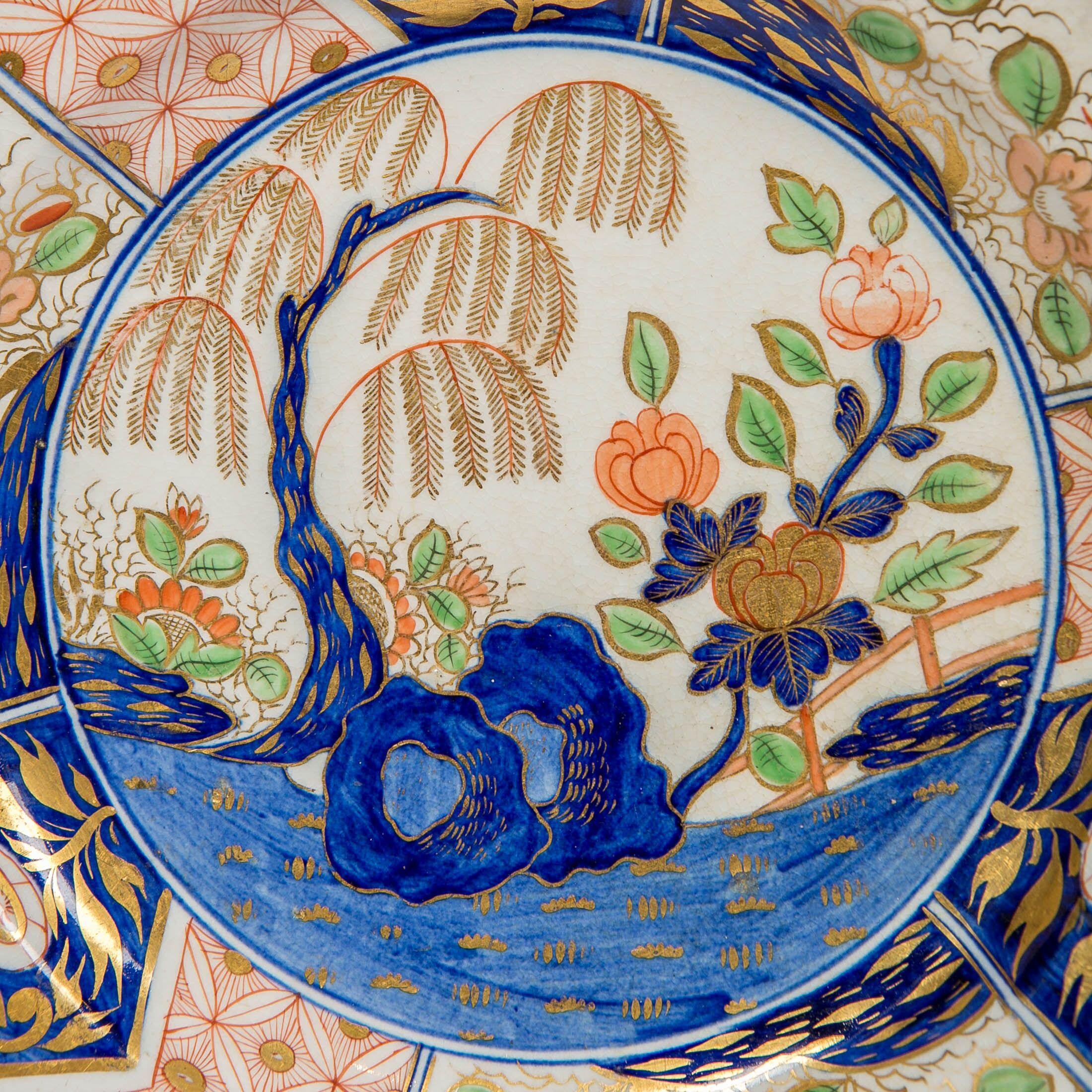 English Set of Rock and Tree Pattern Dinner Plates Made in England, circa 1820