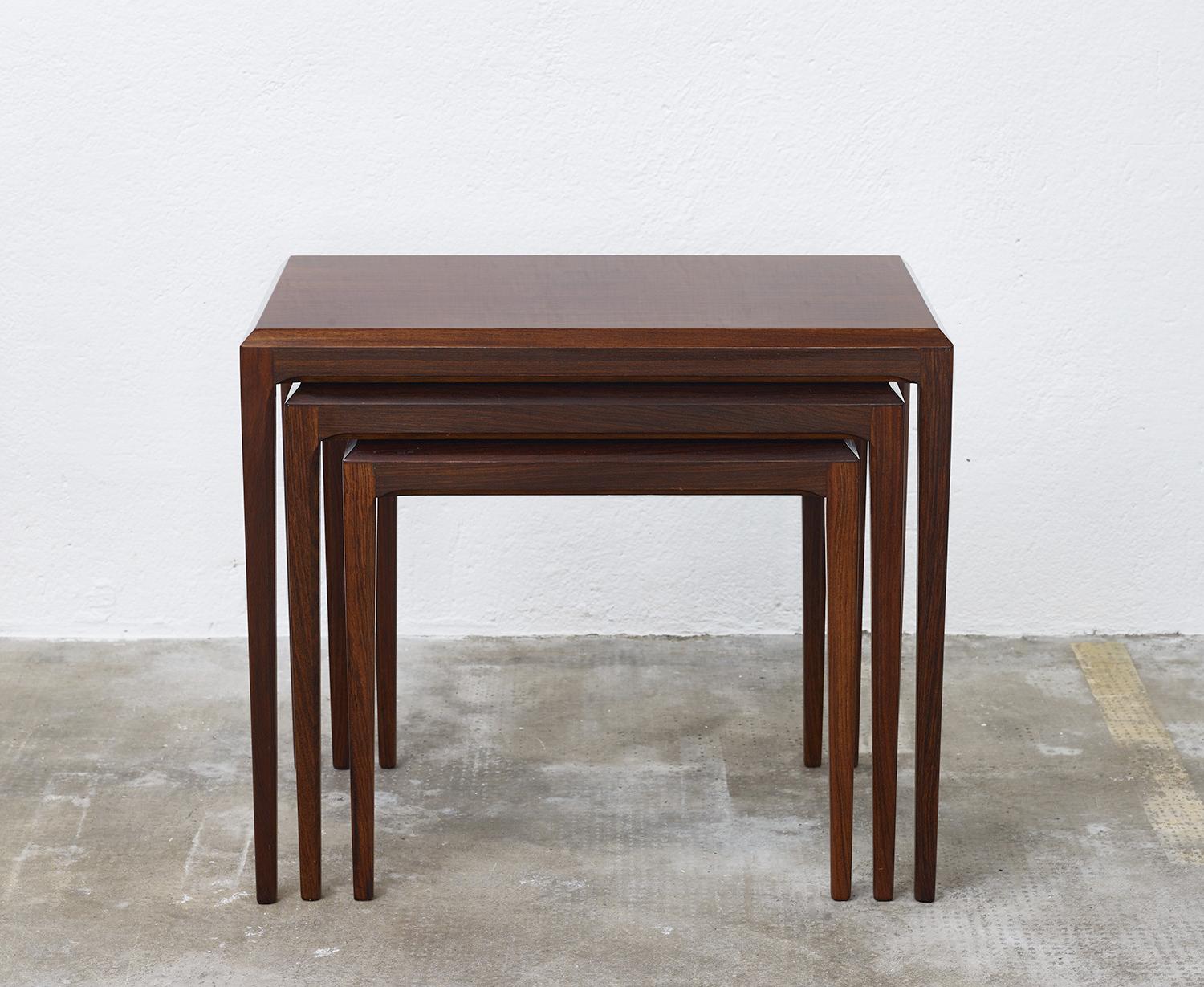 Set of rosewood nesting tables by Johannes Andersen for CFC Silkeborg, Denmark.

Beautiful set of rosewood nesting tables by Danish designer Johannes Andersen for CHF Silkeborg, circa 1960.

The refined details as well as the sleek legs make