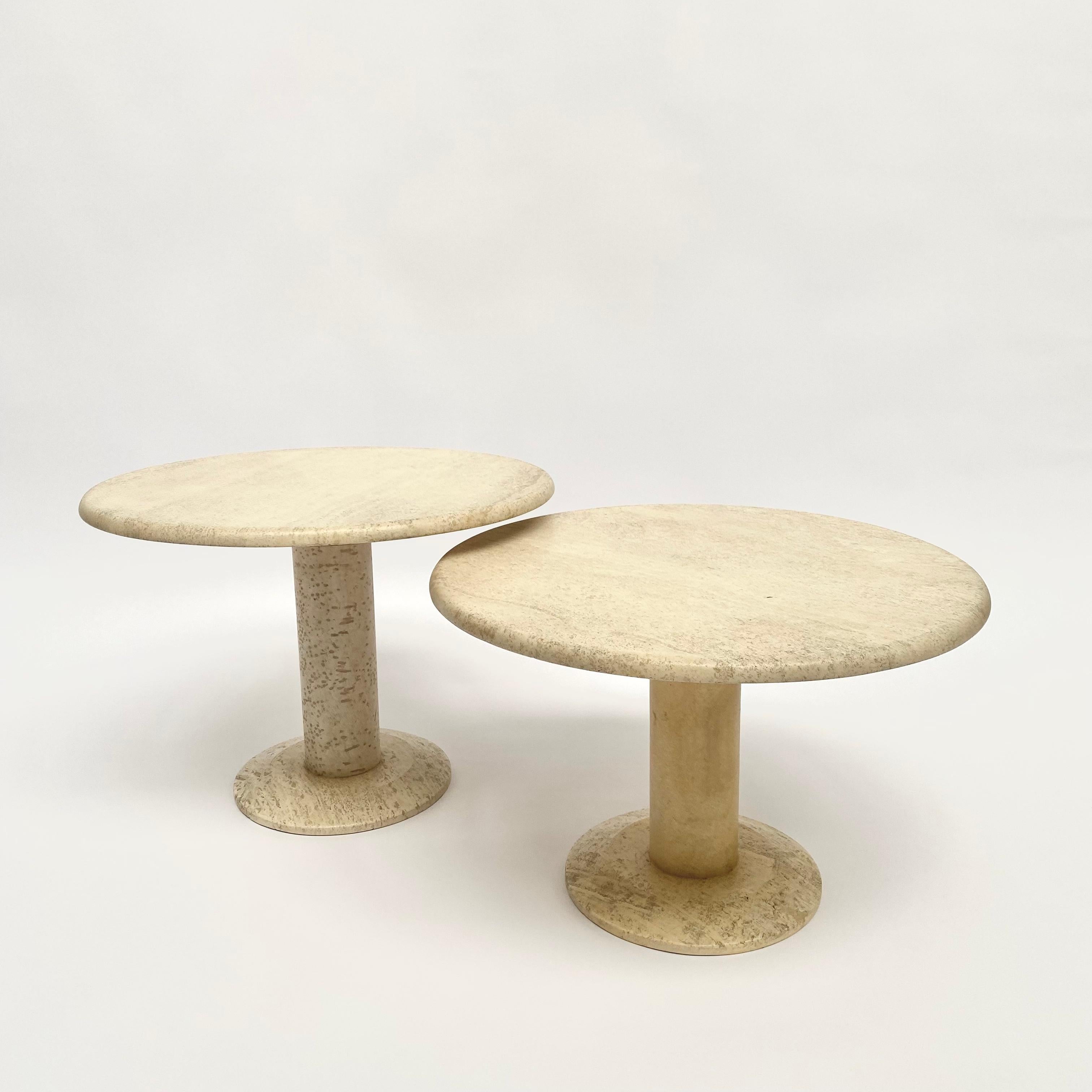 Coffee table set, travertine, Europe, 1970s. Beautiful coffee table completely executed in travertine. The base consists of round pedestal. With the bright natural material travertine, the characteristics of the limestone create a striking