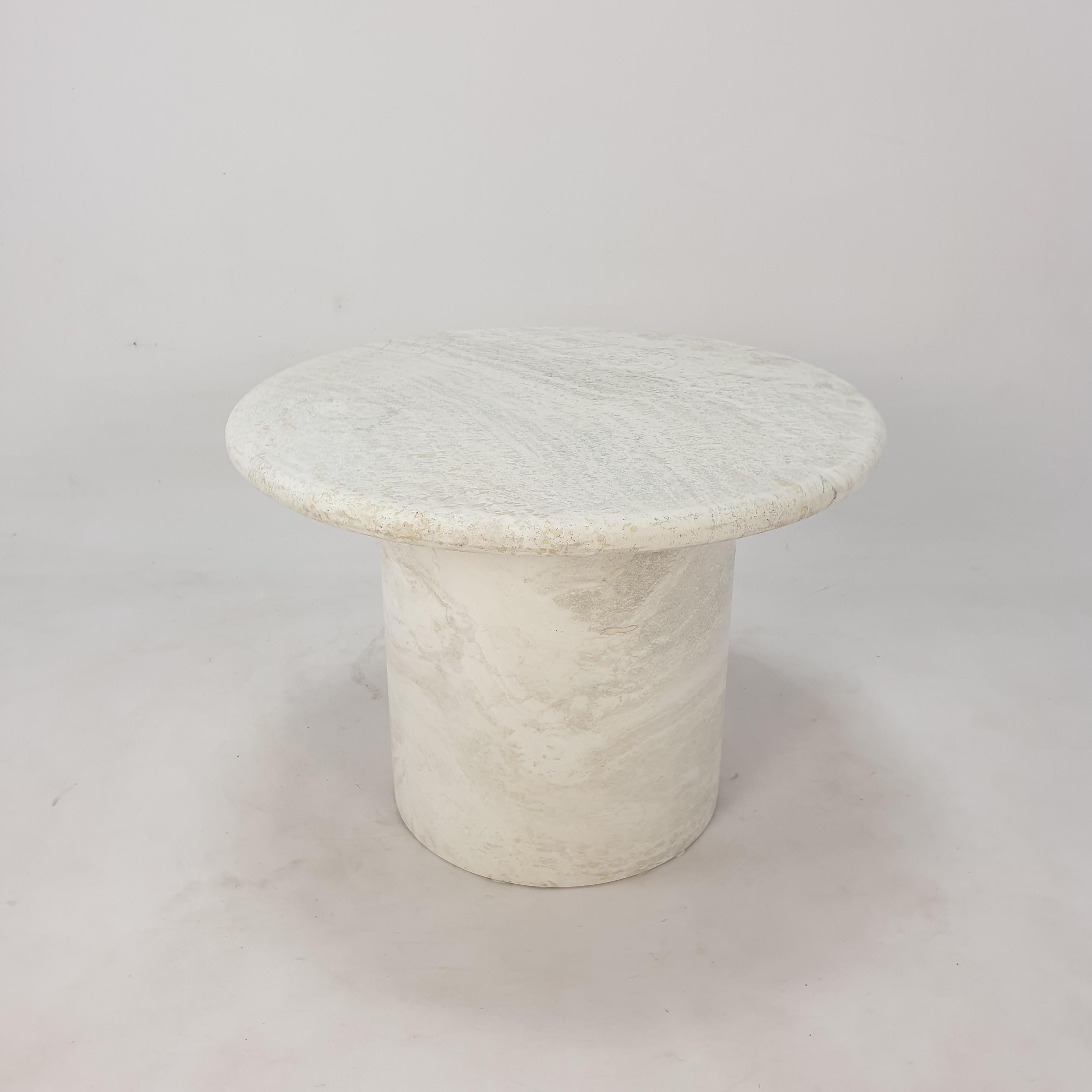 This very nice set of Italian coffee tables is made by the Italian company Up & Up, 1970's.

They are handcrafted out of travertine. 

The have a beautiful round top and a round base, they can be separated.

There is a set available, but it is
