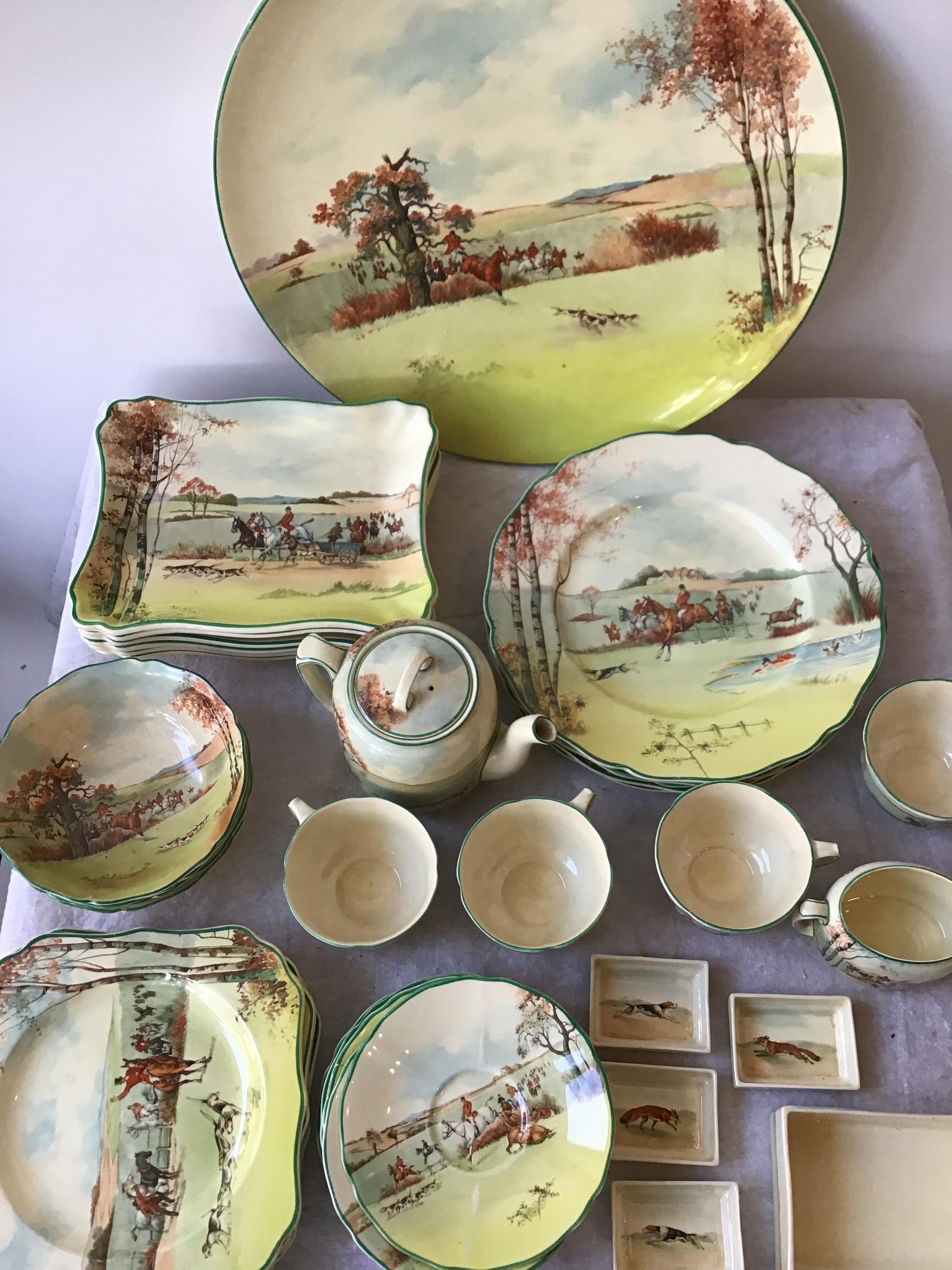 1 large serving platter
6 dessert plates
5 dinner plates
8 saucer plates
4 fruit bowls
Teapot
4 tea cups
5 salad plates
Sugar bowl
4 salt boxes
Cigarette box.