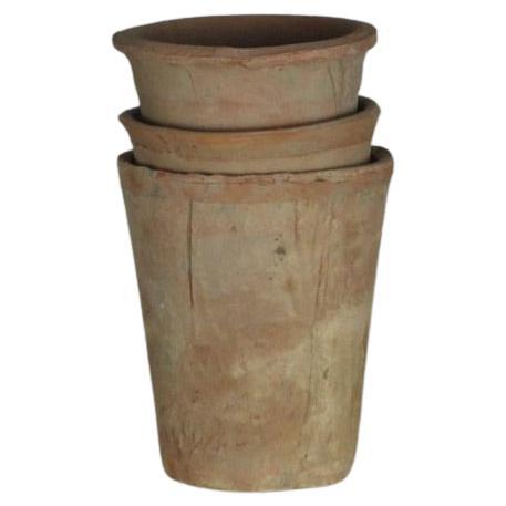 Set of Rustic Antique Stacking Pots For Sale