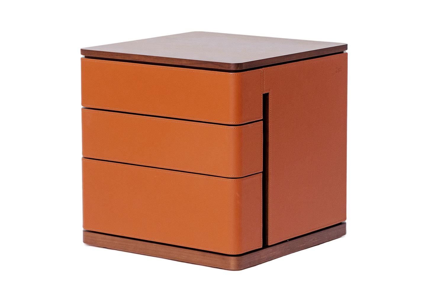 Fidelio Notte night tables by Poltrona Frau

Defined by warm, dark tones of the conac saddle-leather and a Canaletto walnut wood exterior, with luminous, natural maple in interior of the drawers these Fidelio Notte bedside tables are part of the