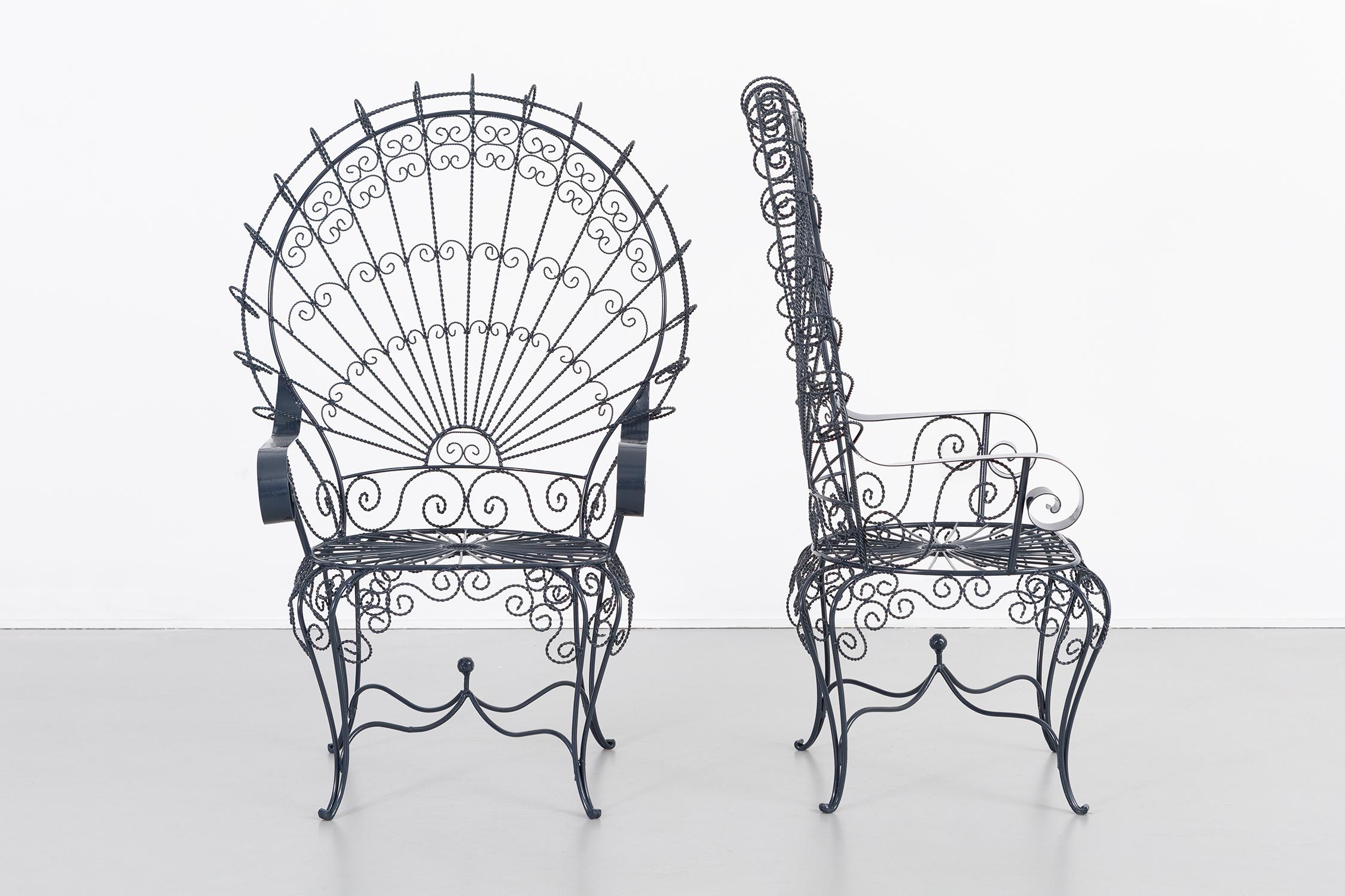 Set of two Peacock chairs.

Designed by John Salterini.

USA, circa 1930s.

Wrought iron.

Freshly powder coated.

Measures: 48 ?” H x 32 9/16” W x 23 ?” D x seat 16 5/8” H.

Color sample of powder coating available upon request.