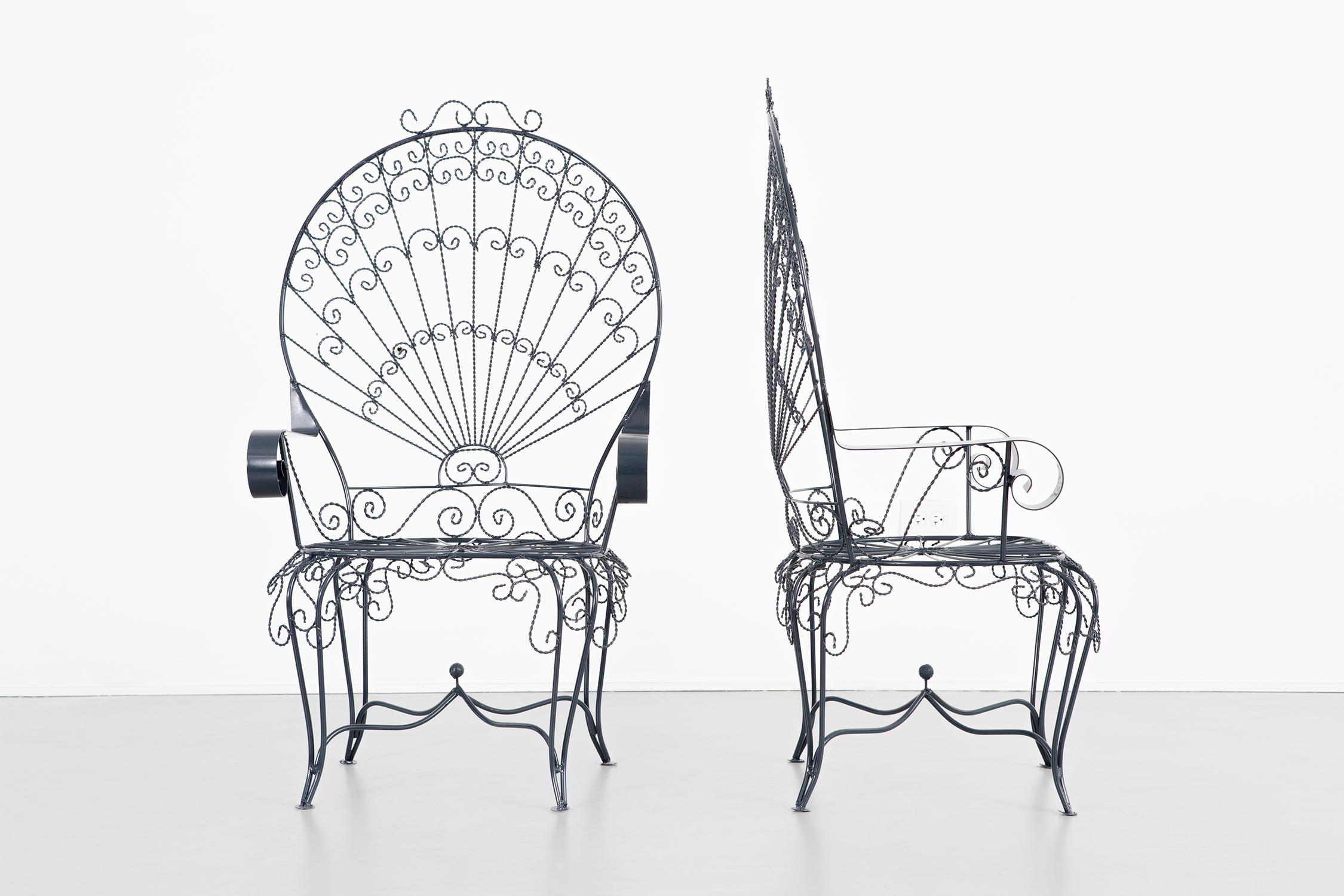Set of two Peacock chairs

designed by John Salterini

USA, circa 1930s

wrought iron

freshly powder coated 

Measures: 47 ?” H x 27” W x 21 ½” D x seat 16 ½” H.

color sample of powder coating available upon request
