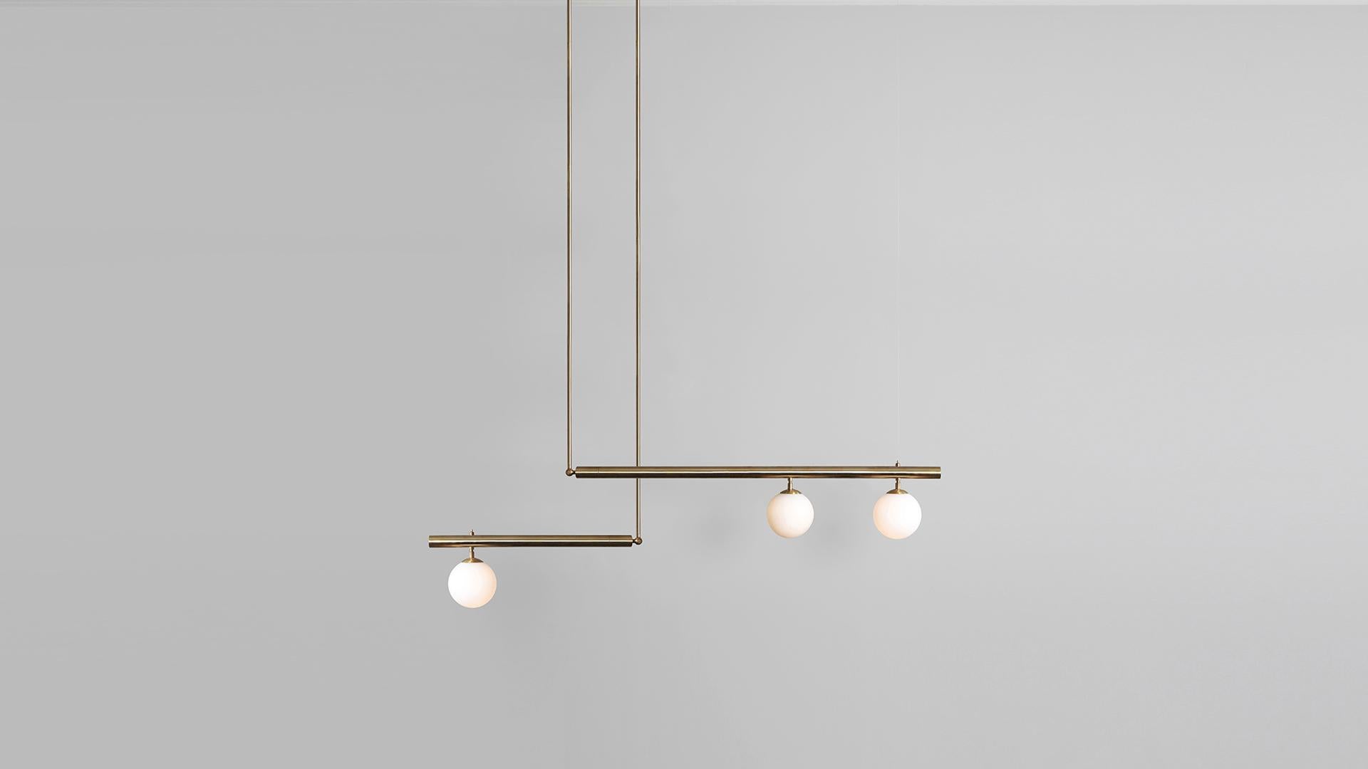 Set of satellite I II sculpted pendant by Paul Matter
Materials: Brass with brushed brass details.
Dimensions: 182 x 129.5 x 15.2 cm
 182 x 89 x 15.2 cm

Satellite is inspired by the conceptual and Minimalist movement of the 1960s and 1970s.