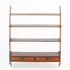 Set of satinwood and mahogany hanging waterfall bookshelves