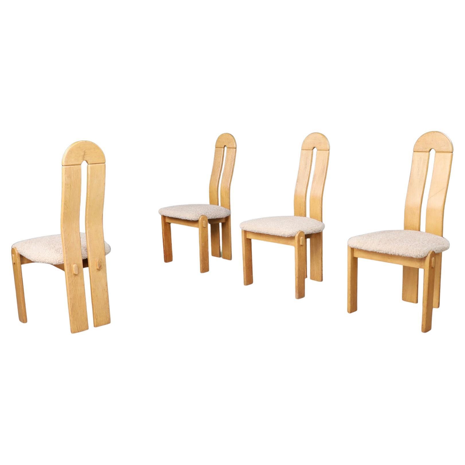Set of Scandinavian Modern High Back Oak Dining Chairs with Teddy Upholstery

This striking set of four modern Scandinavian dining chairs from the 1970s embodies the minimal elegance and functional charm characteristic of Nordic design. The