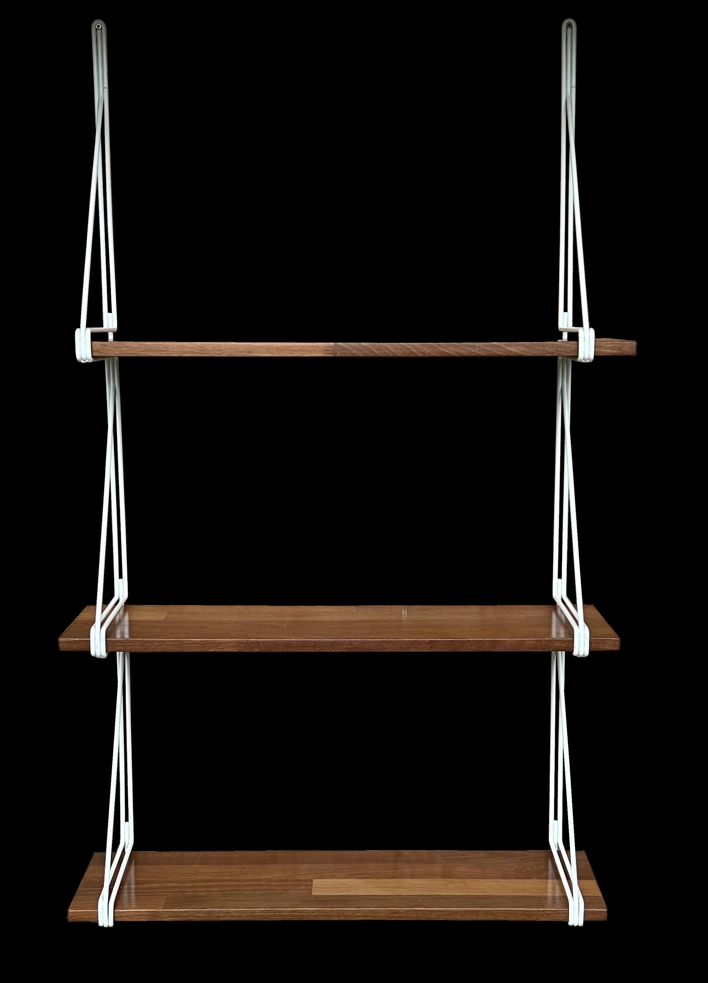 A set of 3 teak shelves supported by white coated steel brackets, nicely desgned so that only 2 screws are needed each side to hold 3 shelves.