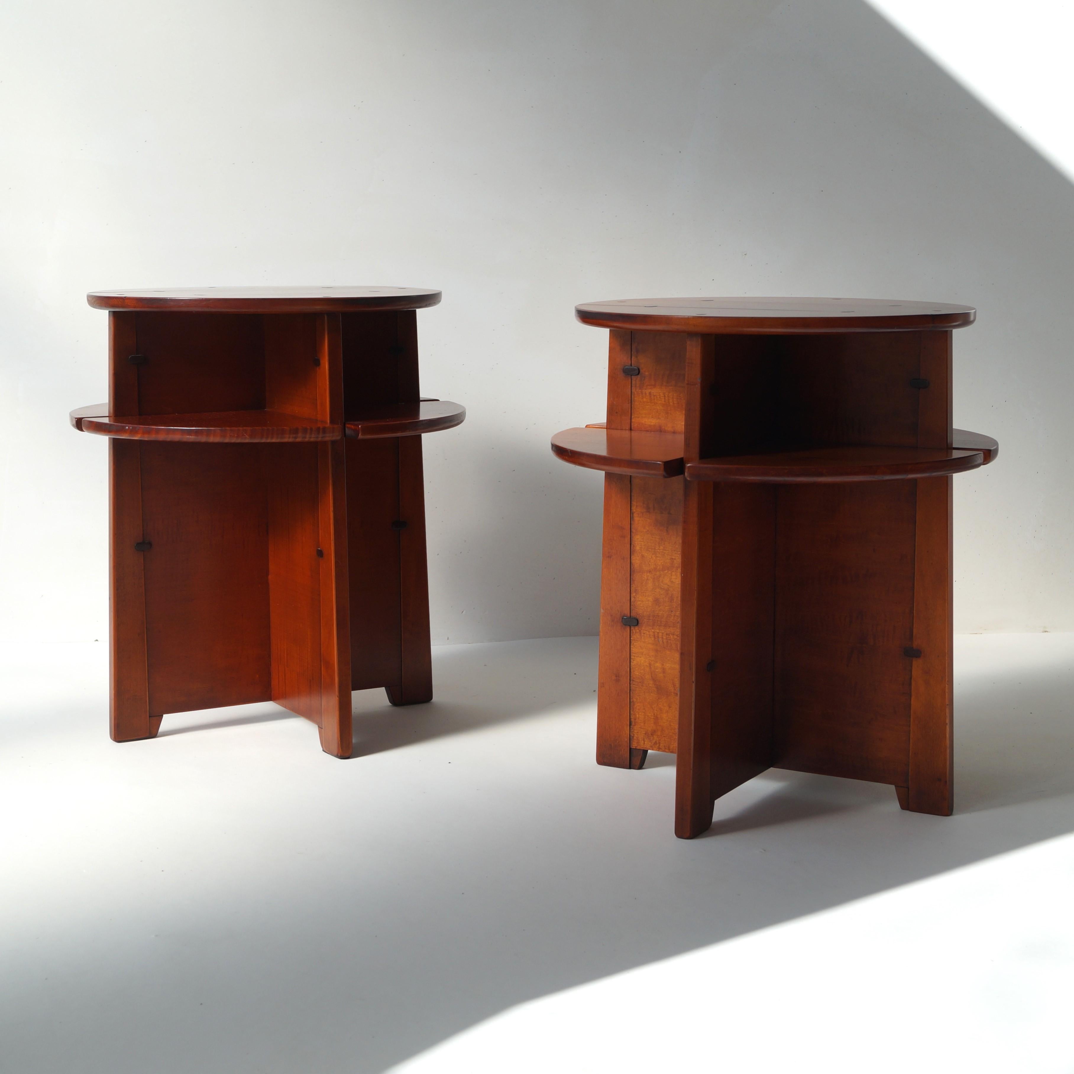Sold as a set or per item - price is per item. 

A set of two modernist Dutch occasional tables, ca. 1980, in solid cherry wood. Quite an unusual design with the division in shelves and the accents in the joints. 

The furniture manufacturer