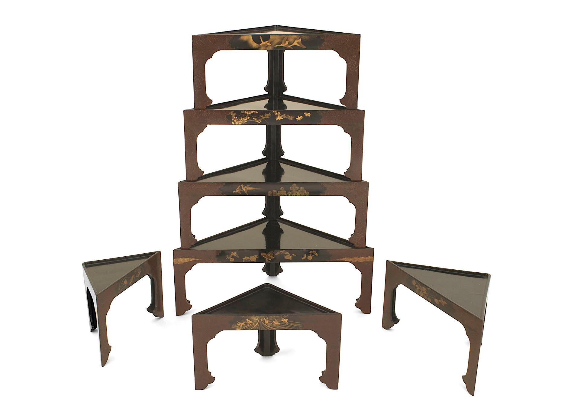 Set of seven Asian Japanese (19th Century) stacked black lacquered tables in the form of a tiered corner etagere with each table decorated with finely painted scenes.
 